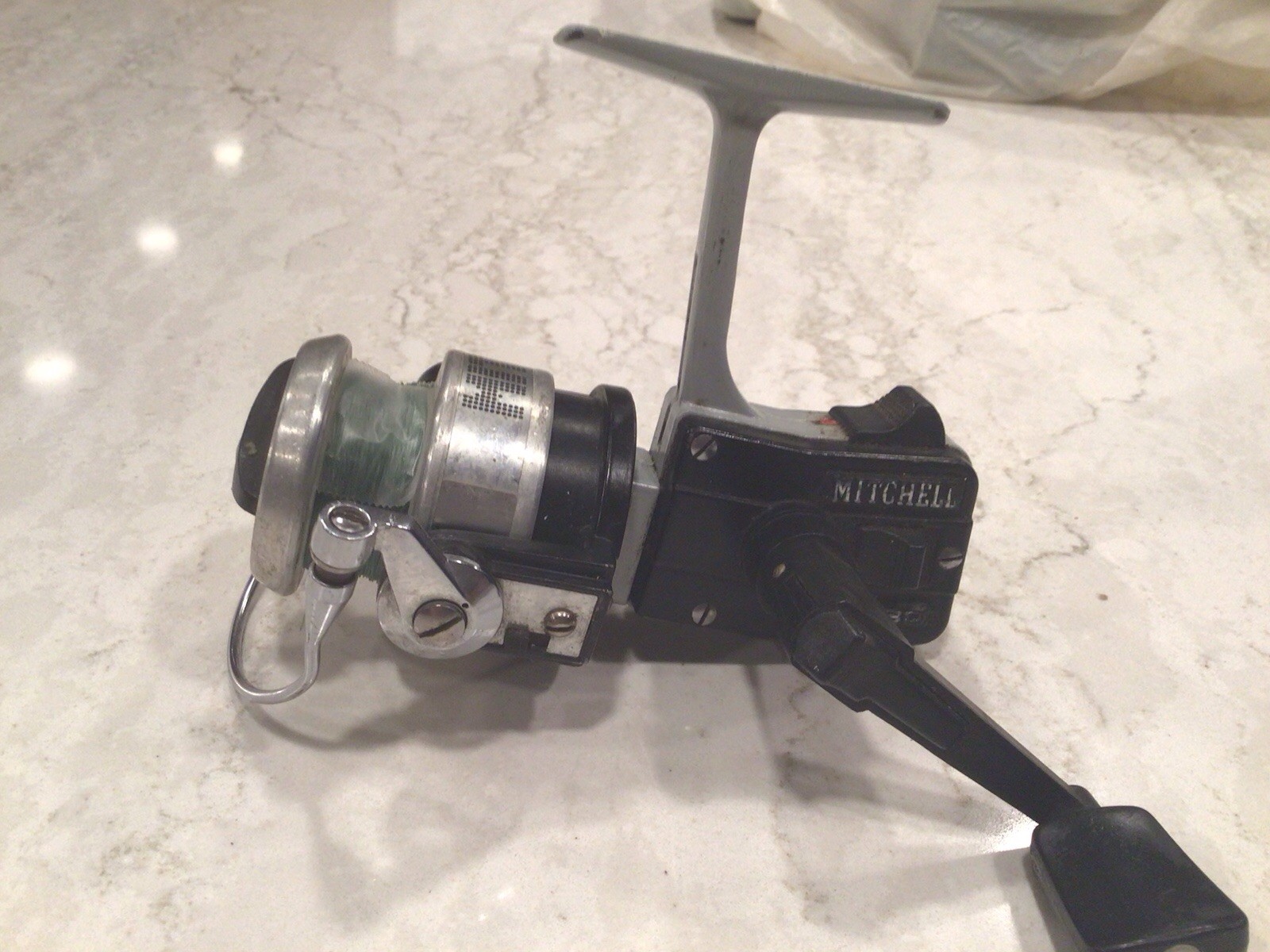 Mitchell 4430 Vintage Spinning Fishing Reel Black/Silver with Line