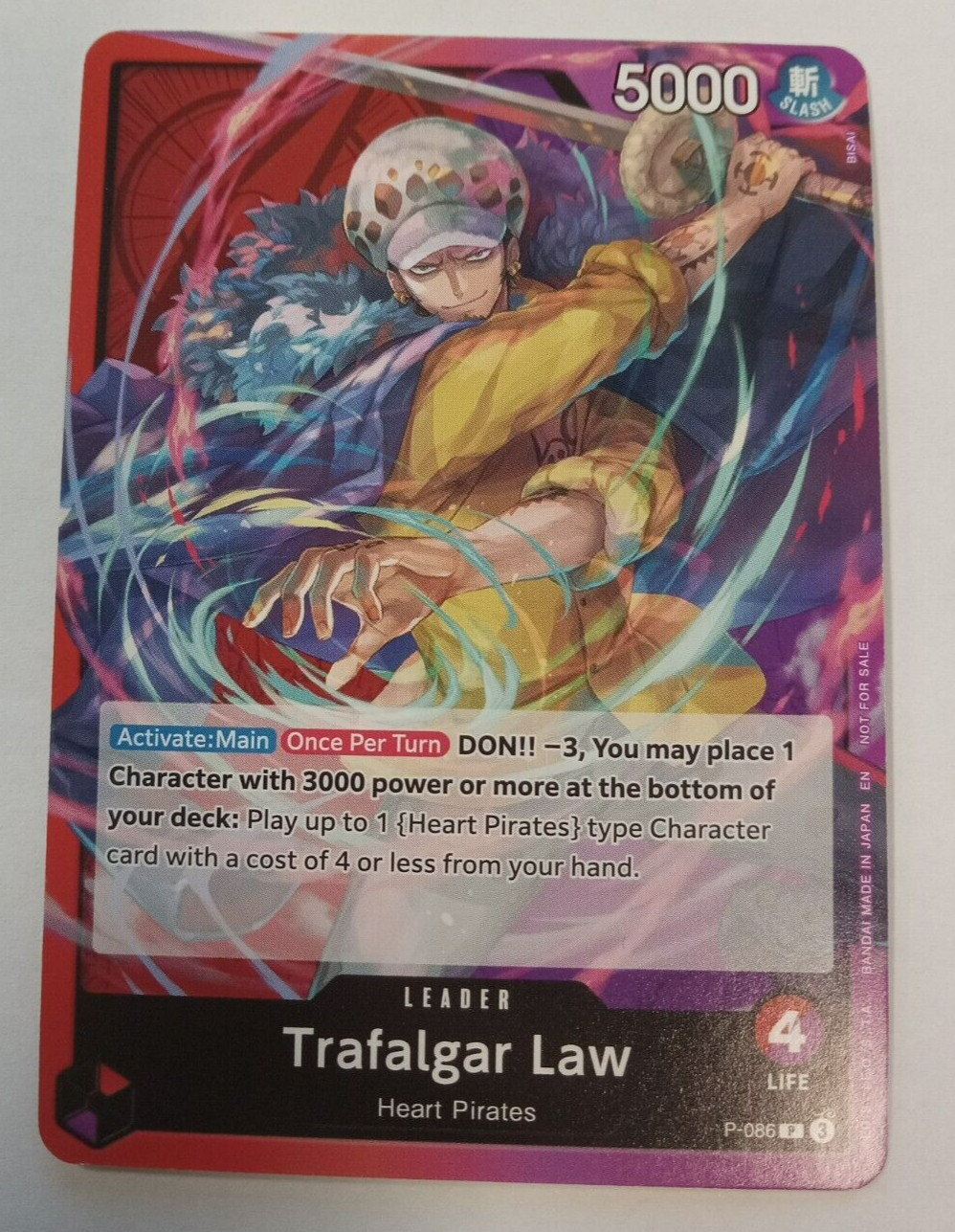 One Piece - Trafalgar Law - P-086 - OP10 Release Event Red/Purple NM One Piece - Trafalgar Law - P-086 - OP10 Release Event Red/Purple NM