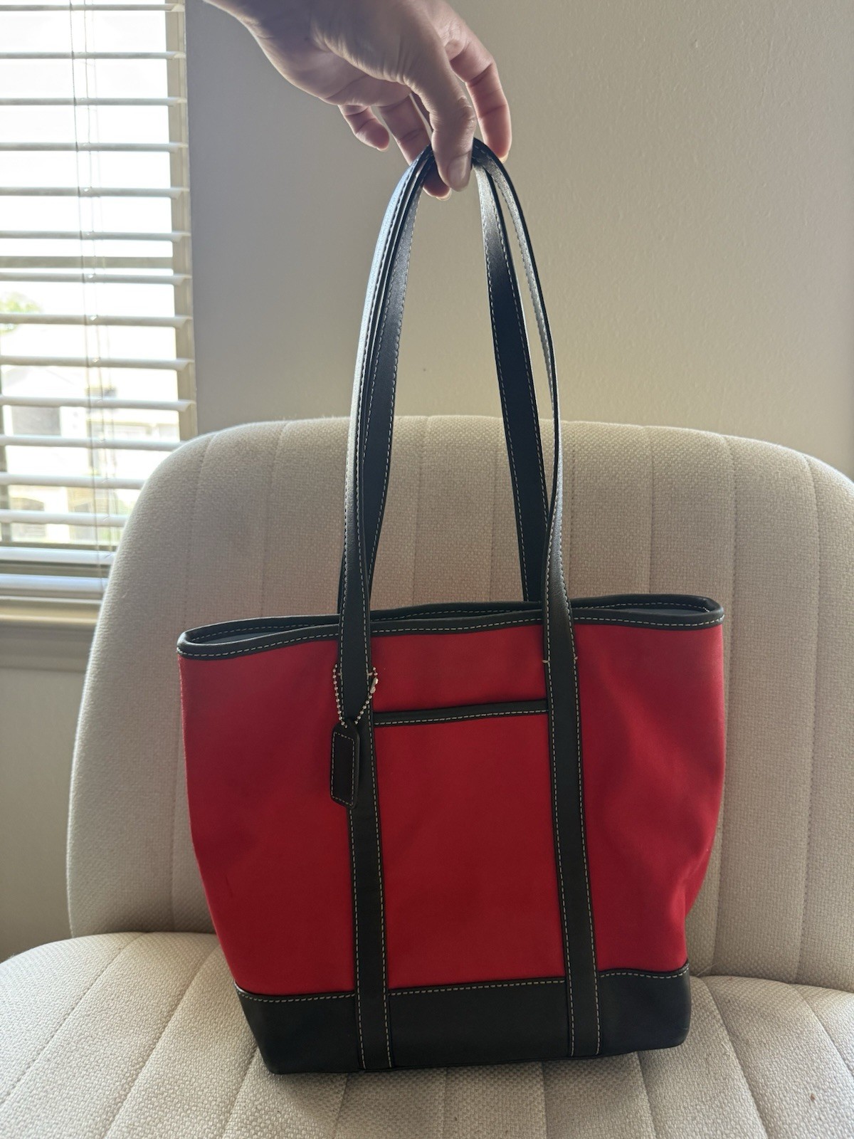 Vintage Coach small tote red canvas with black leather trim and a blue interior. Vintage Coach small tote red canvas with black leather trim and a blue interior.