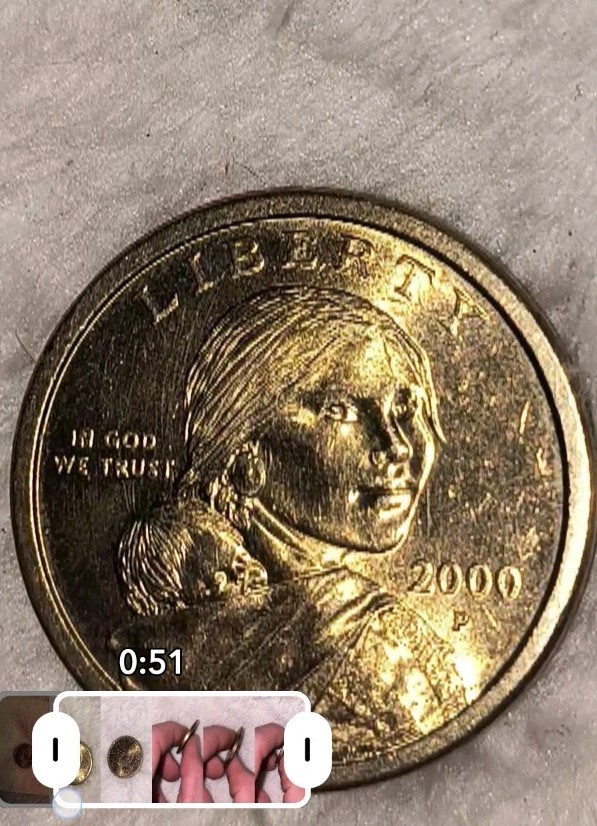 2000-P Sacagawea Golden Dollar coin.  Rare errors.