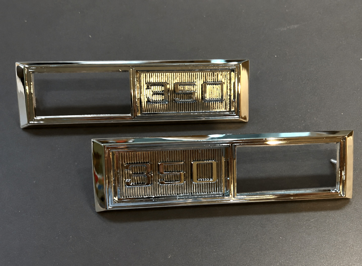 1968-1969 Impala Chevelle El Camino Front Marker Light Bezel 350 Emblem PAIR Nov