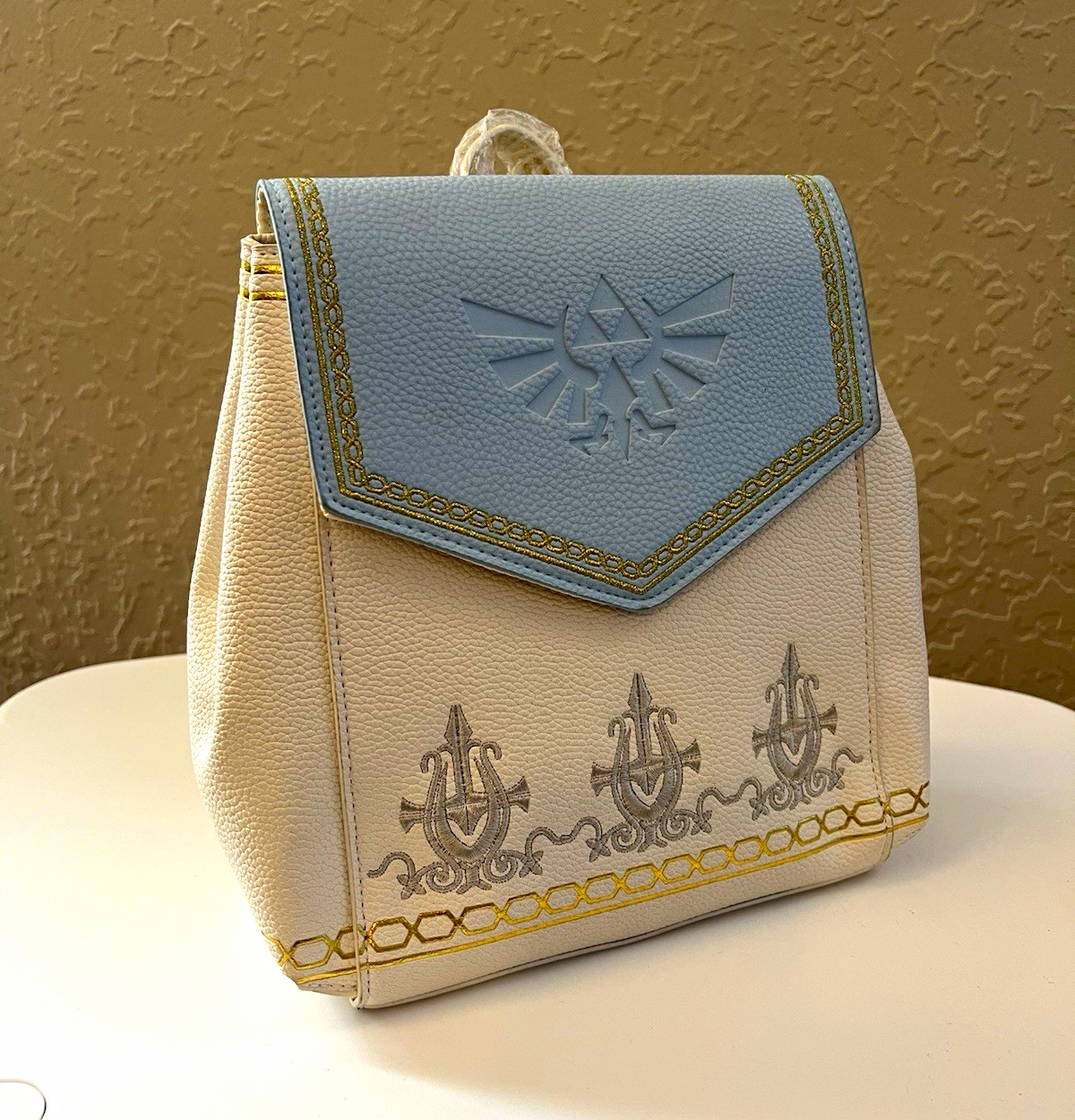 Danielle Nicole Zelda Small Backpack White/Light Blue Embroidered Gold Hardware Danielle Nicole Zelda Small Backpack White/Light Blue Embroidered Gold Hardware