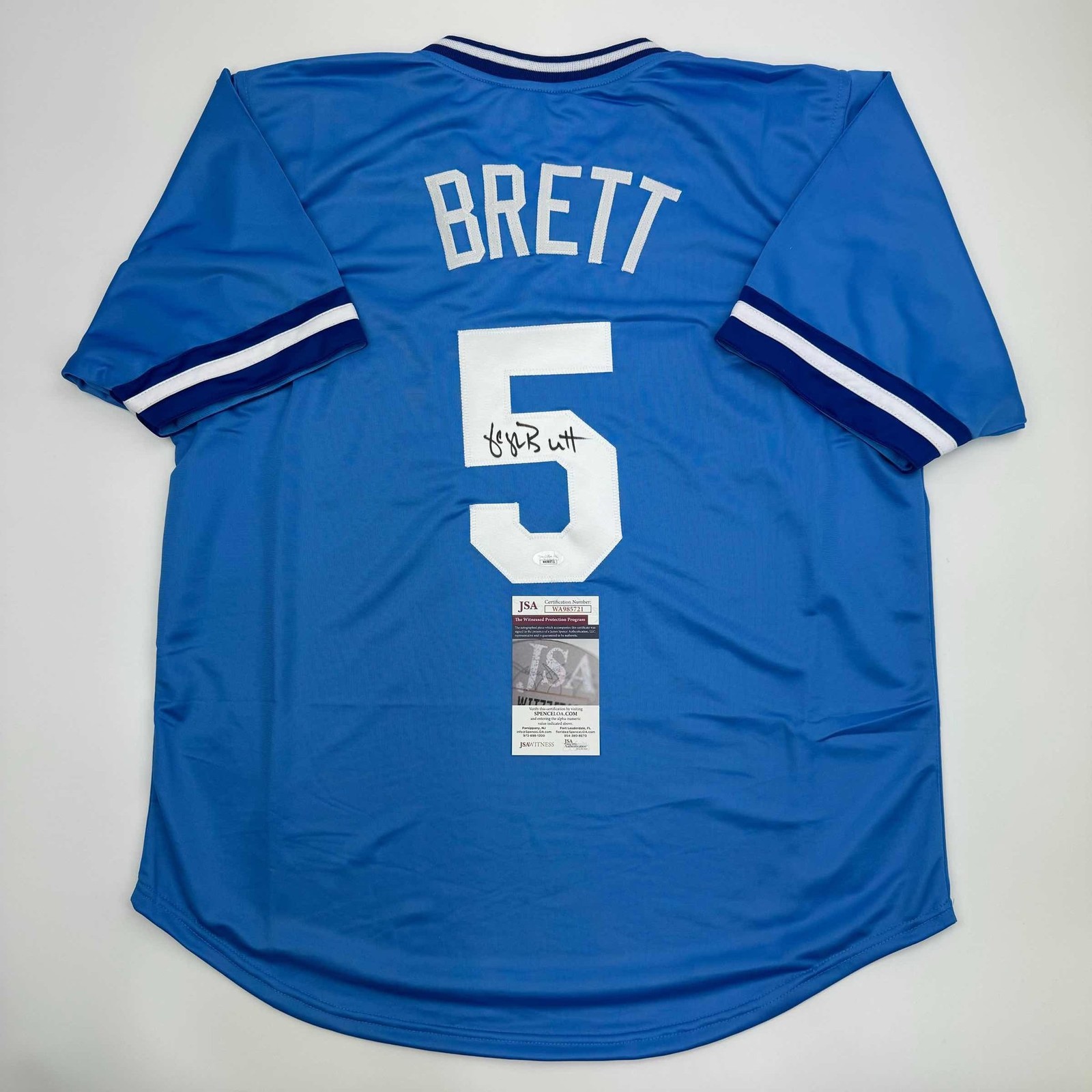 Autographed/Signed George Brett Kansas City Blue Baseball Jersey JSA COA Autographed/Signed George Brett Kansas City Blue Baseball Jersey JSA COA