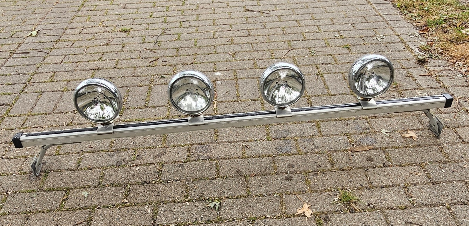 4 Vintage KC HiLites Chrome Lights mounted on a 60