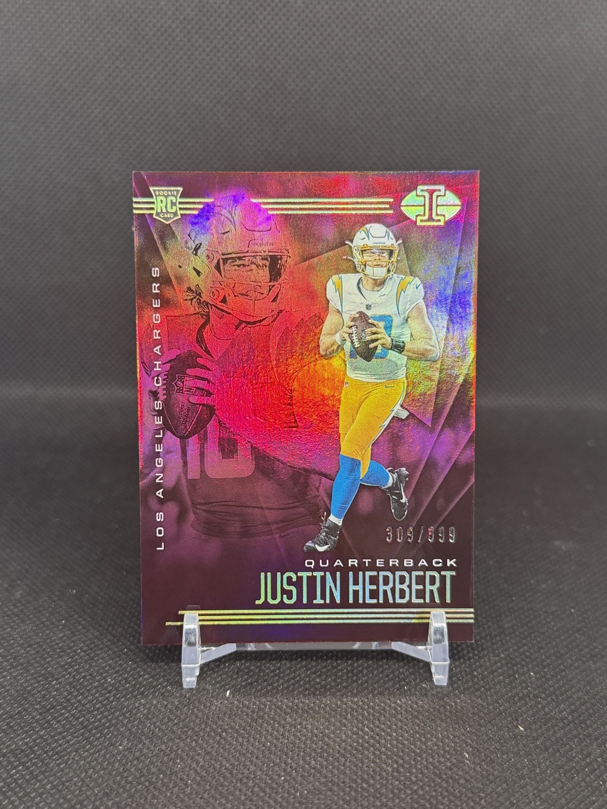 2020 Panini Illusions - Justin Herbert #7 Trophy Collection Pink /399 (RC) 2020 Panini Illusions - Justin Herbert #7 Trophy Collection Pink /399 (RC)