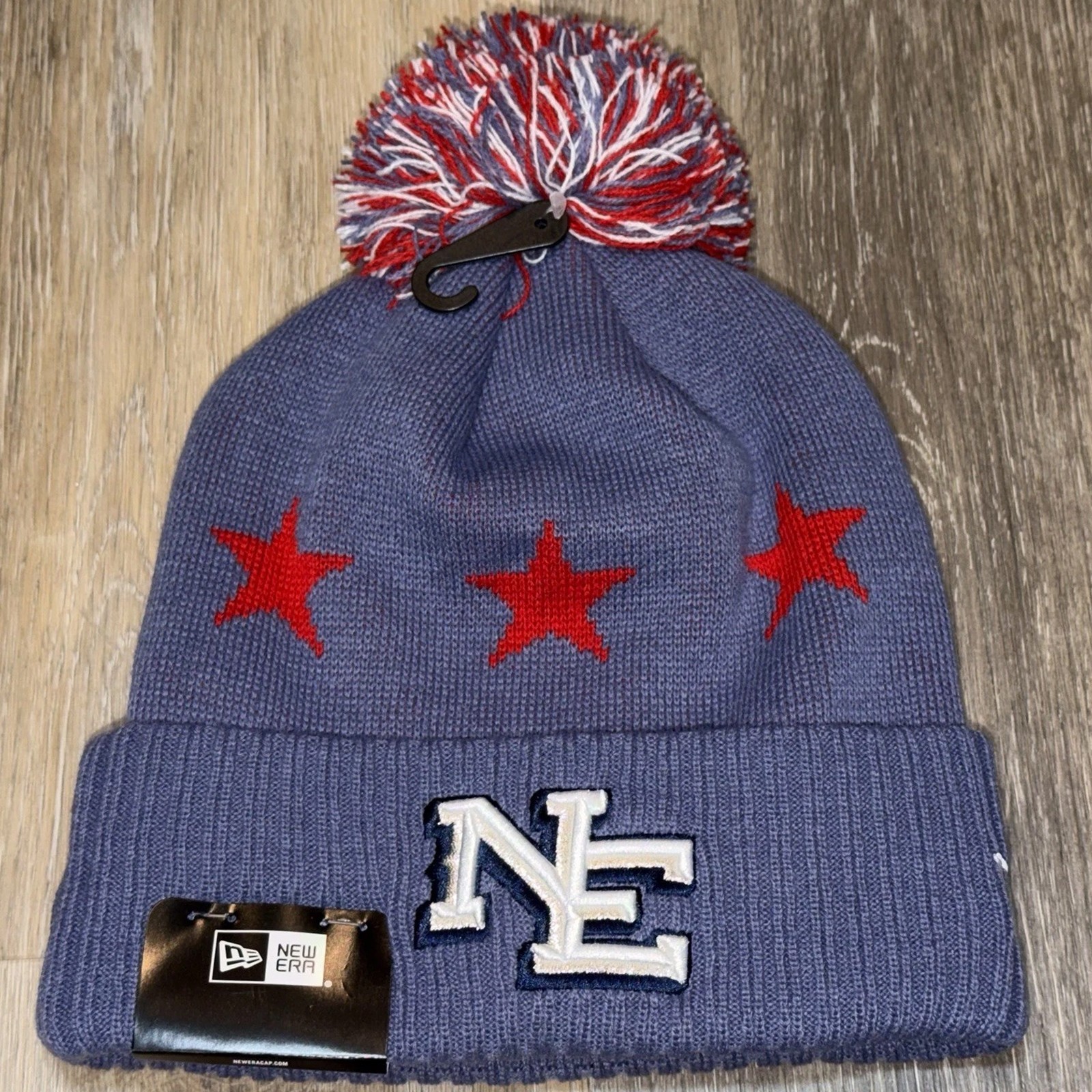 New England Patriots Rivalries New Era NFL Sideline Cuffed Knit Beanie Pom Hat