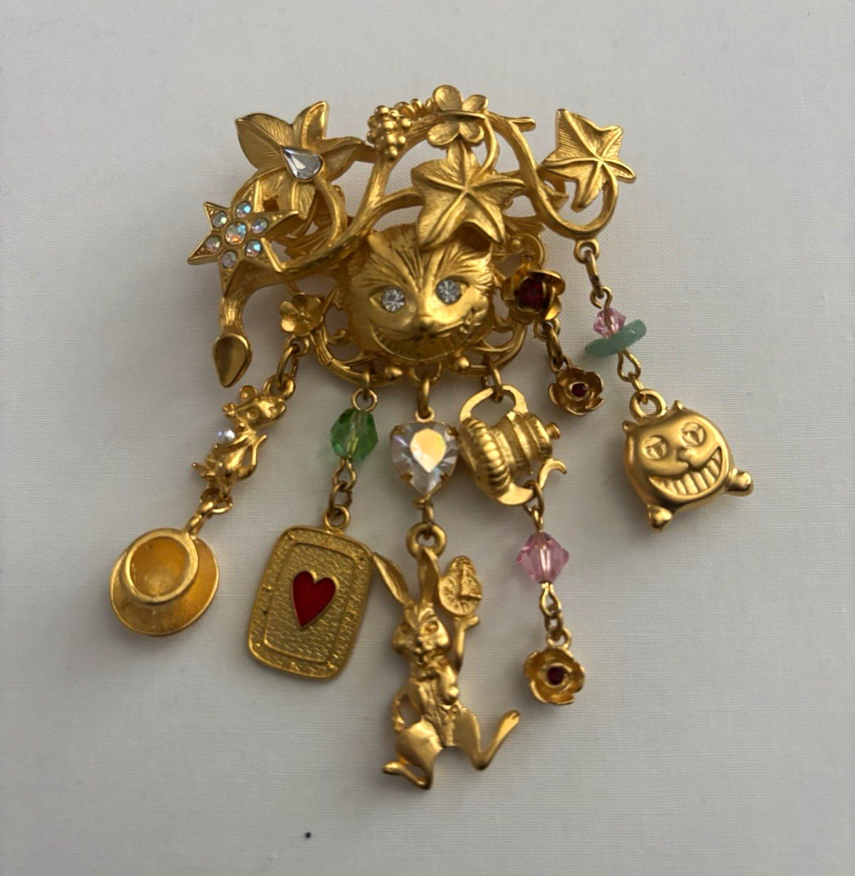 RARE VINTAGE KIRKS FOLLY CHESHIRE CAT /ALICE IN WONDERLAND BROOCH - NEVER WORN