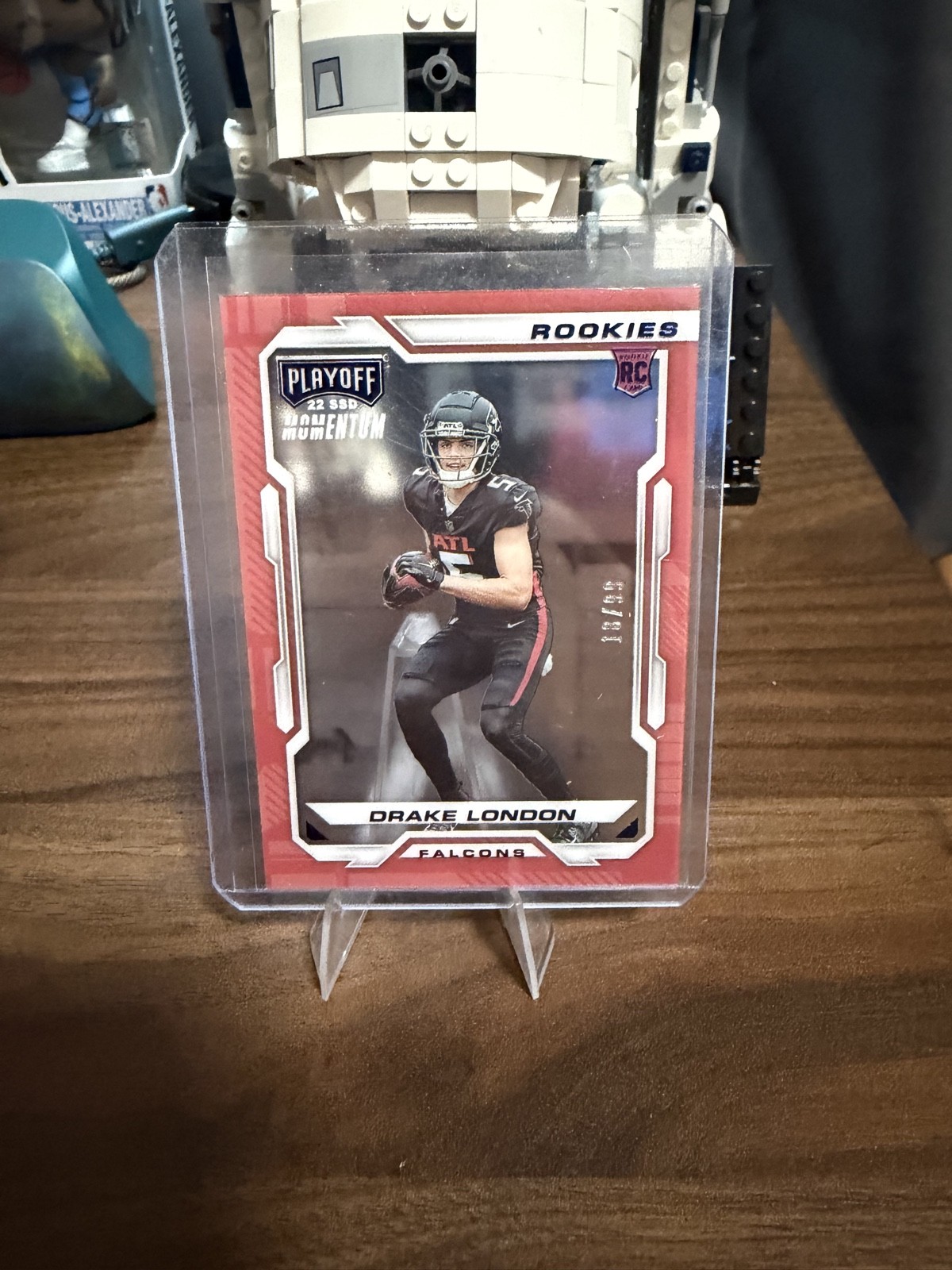 2022 Panini Chronicles - Playoff Momentum Rookies Drake London #-6 Blue /99 (RC)