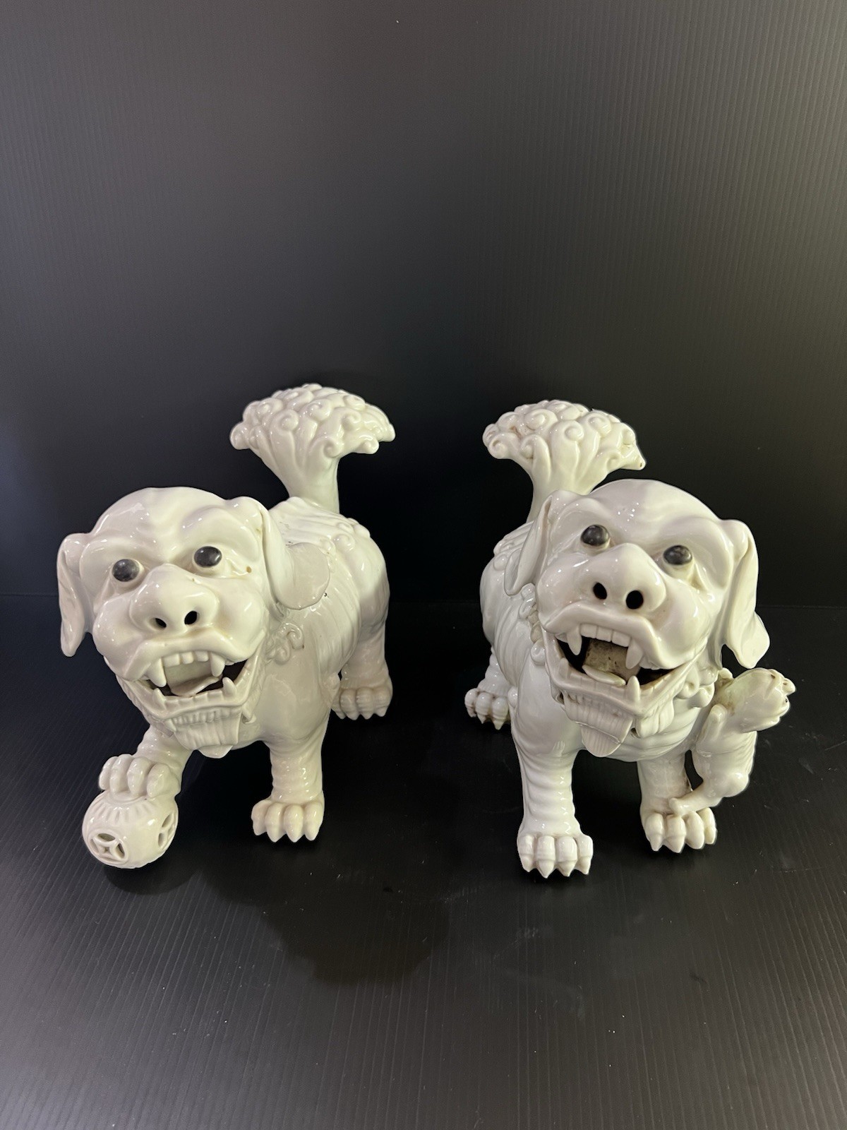 pair of vintage white-glazed ceramic Foo Dogs (Guardian Lions / Shi Shi)