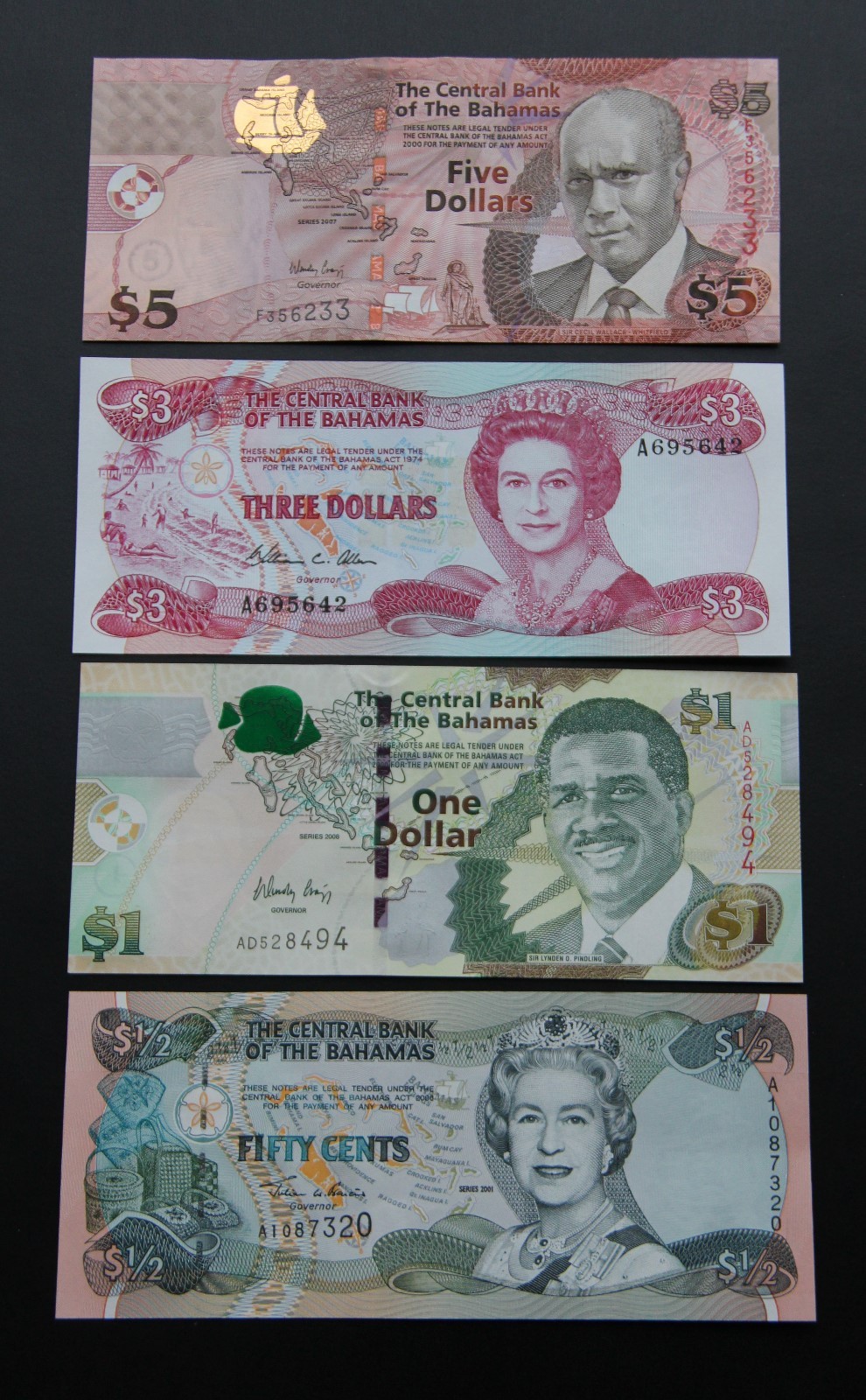 Bahamas Set of 50 Cent, 1, 3 and 5 Dollar Banknotes - UNC Bahamas Set of 50 Cent, 1, 3 and 5 Dollar Banknotes - UNC