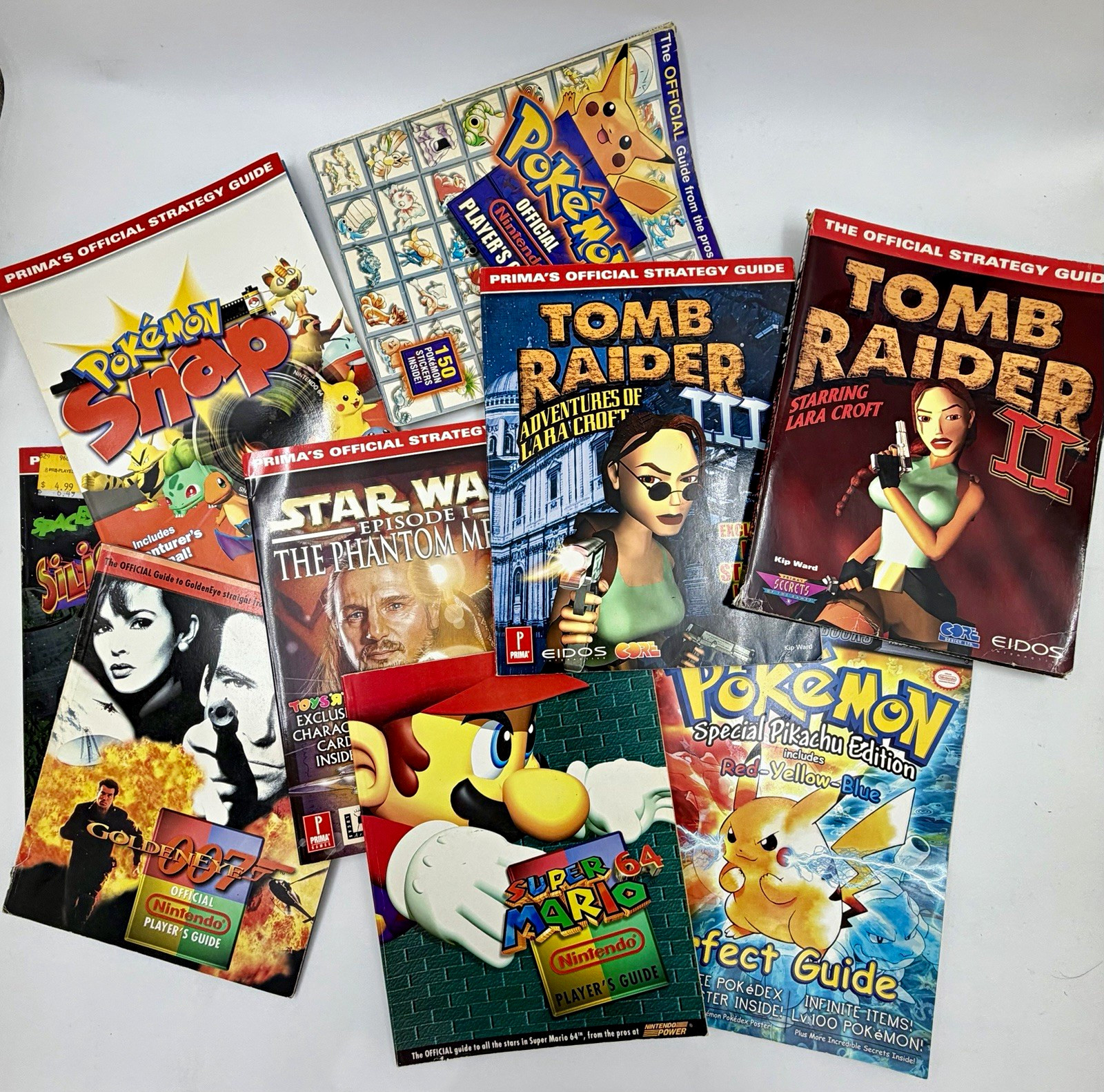 Nintendo/PlayStation Strategy Guide Lot Pokémon, Mario 64, Tomb Raider, 007