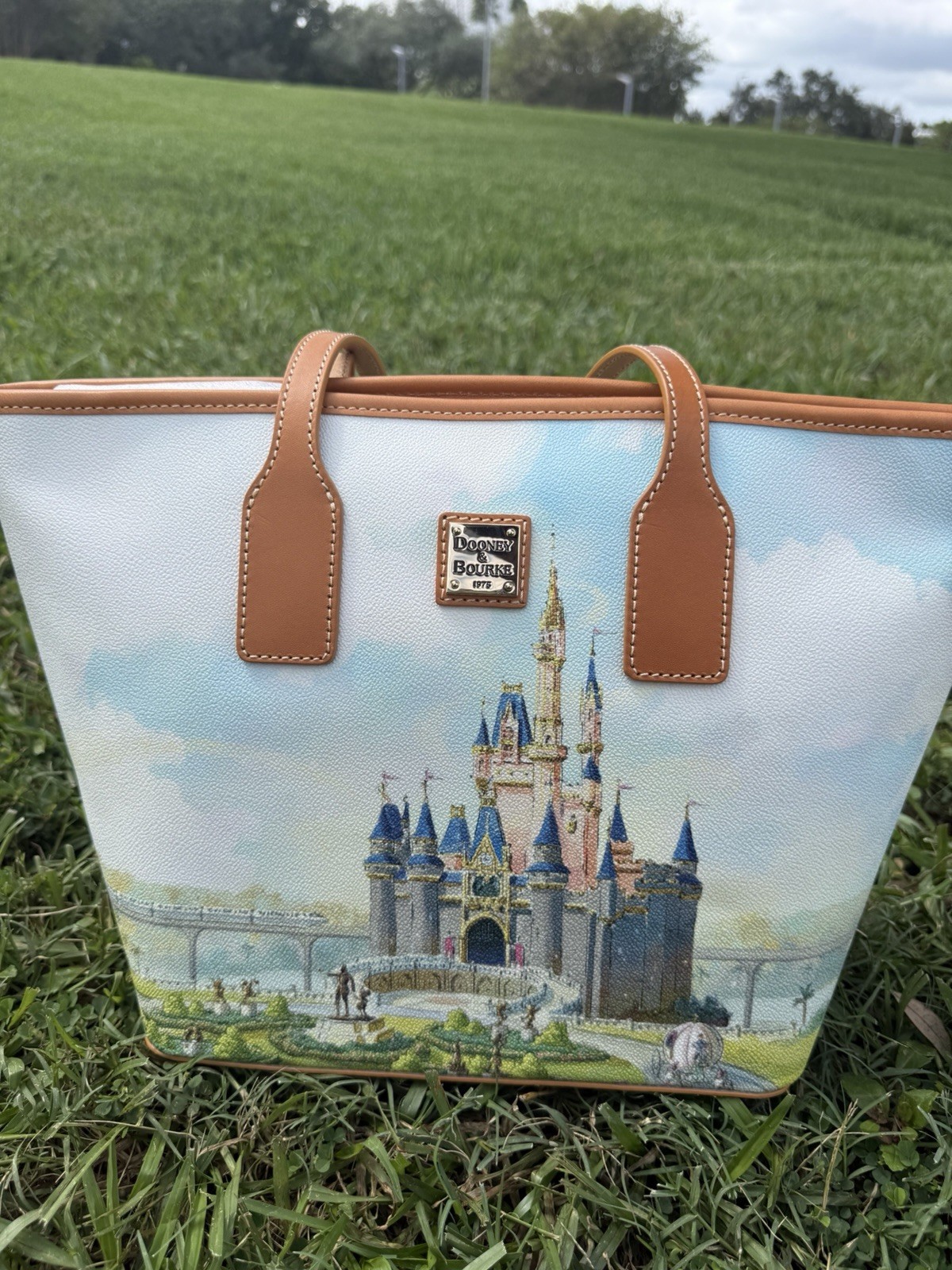 2026 Walt Disney World 55th Anniversary Dooney & Bourke Castle Tote Bag In Hand 2026 Walt Disney World 55th Anniversary Dooney & Bourke Castle Tote Bag In Hand
