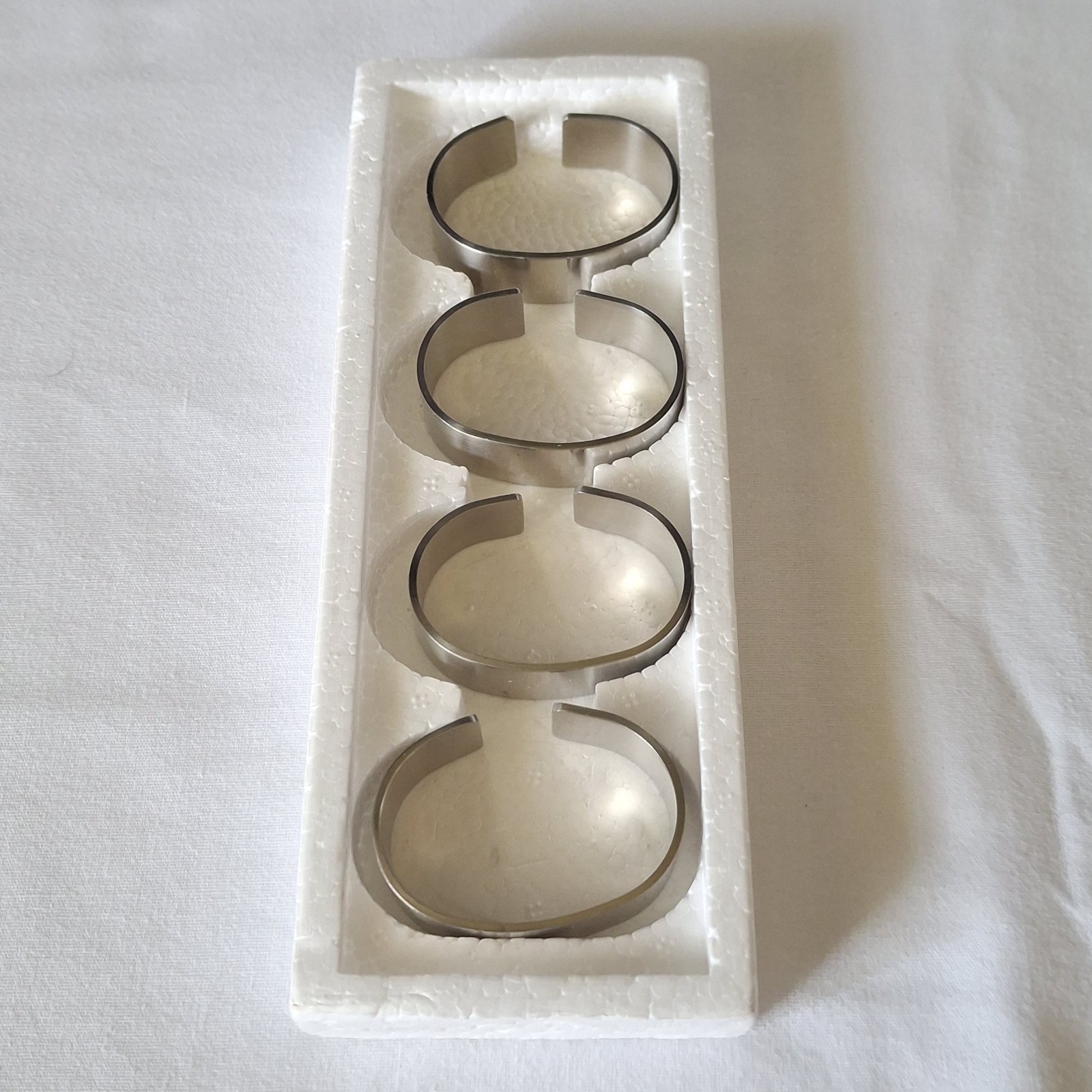 Stelton Denmark Set 4 Napkin Rings Designed by Svend Jensen Stainless Steel