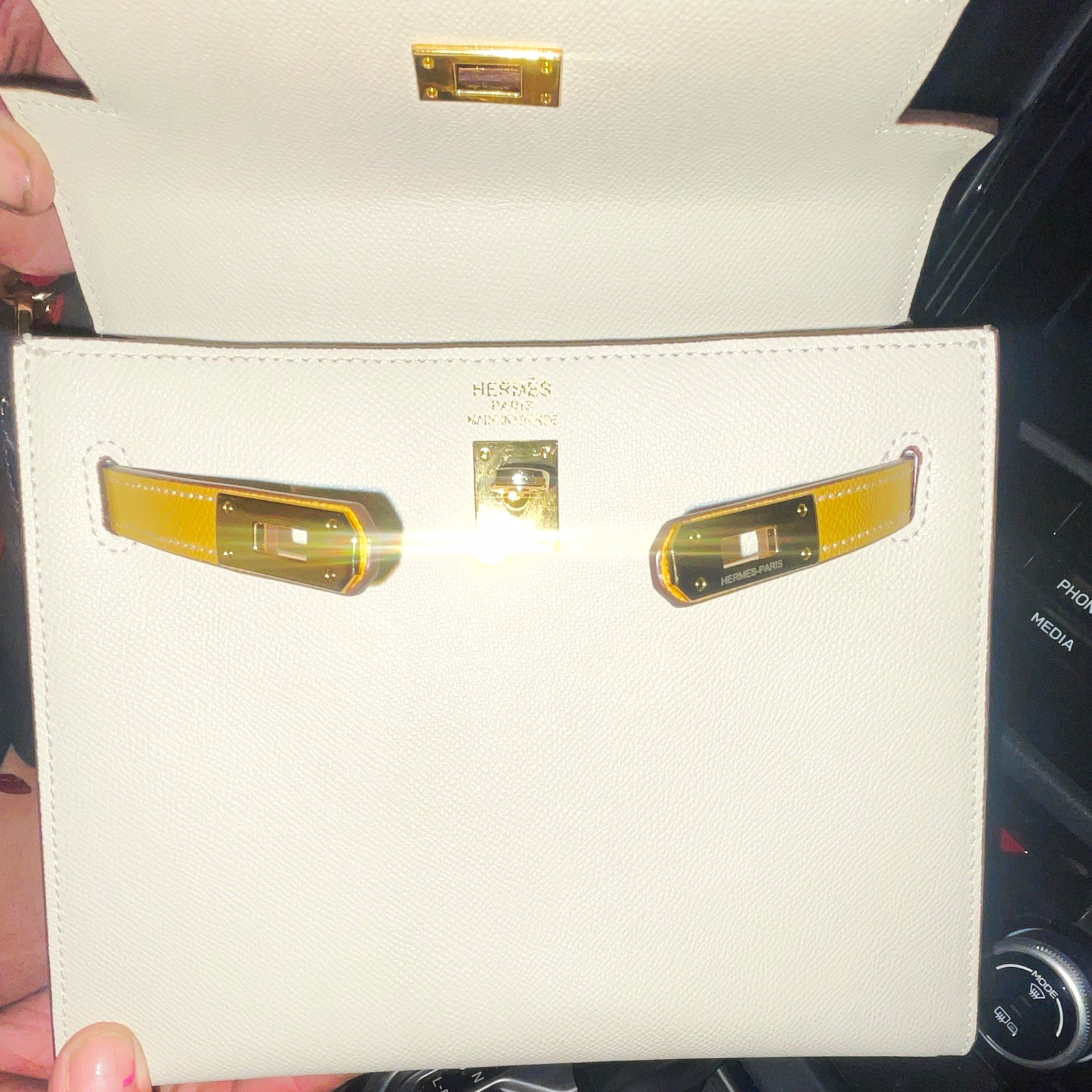 Hand HERMES’ Kelly SmWhiteYellow Textured Leather Top Handle, Gold Turn Lock