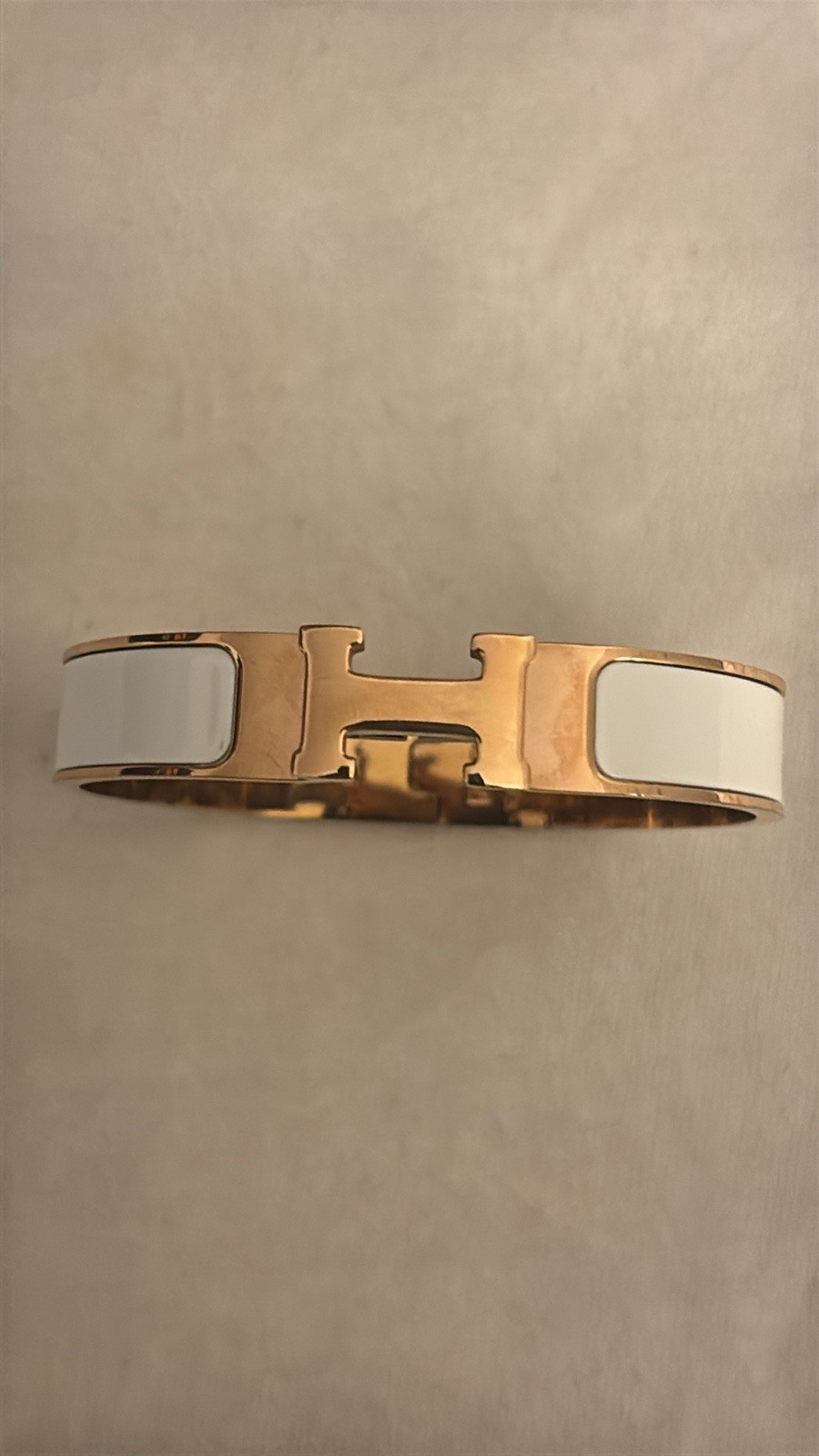 Hermès Clic H bracelet rose gold white enamel pre owned w out box Hermès Clic H bracelet rose gold white enamel pre owned w out box