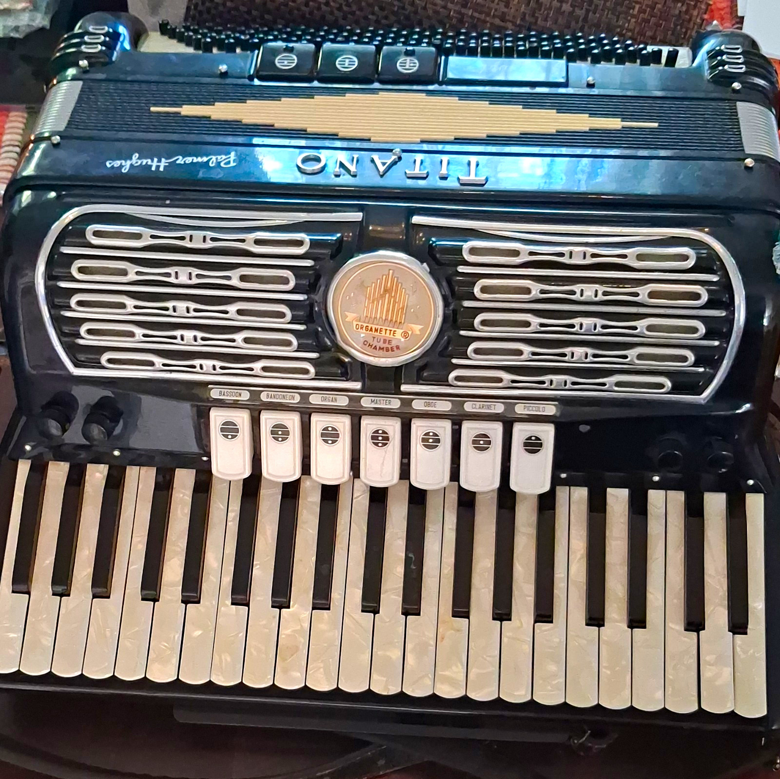 This is a vintage Italian-made Titano Palmer-Hughes Grand piano accordion This is a vintage Italian-made Titano Palmer-Hughes Grand piano accordion