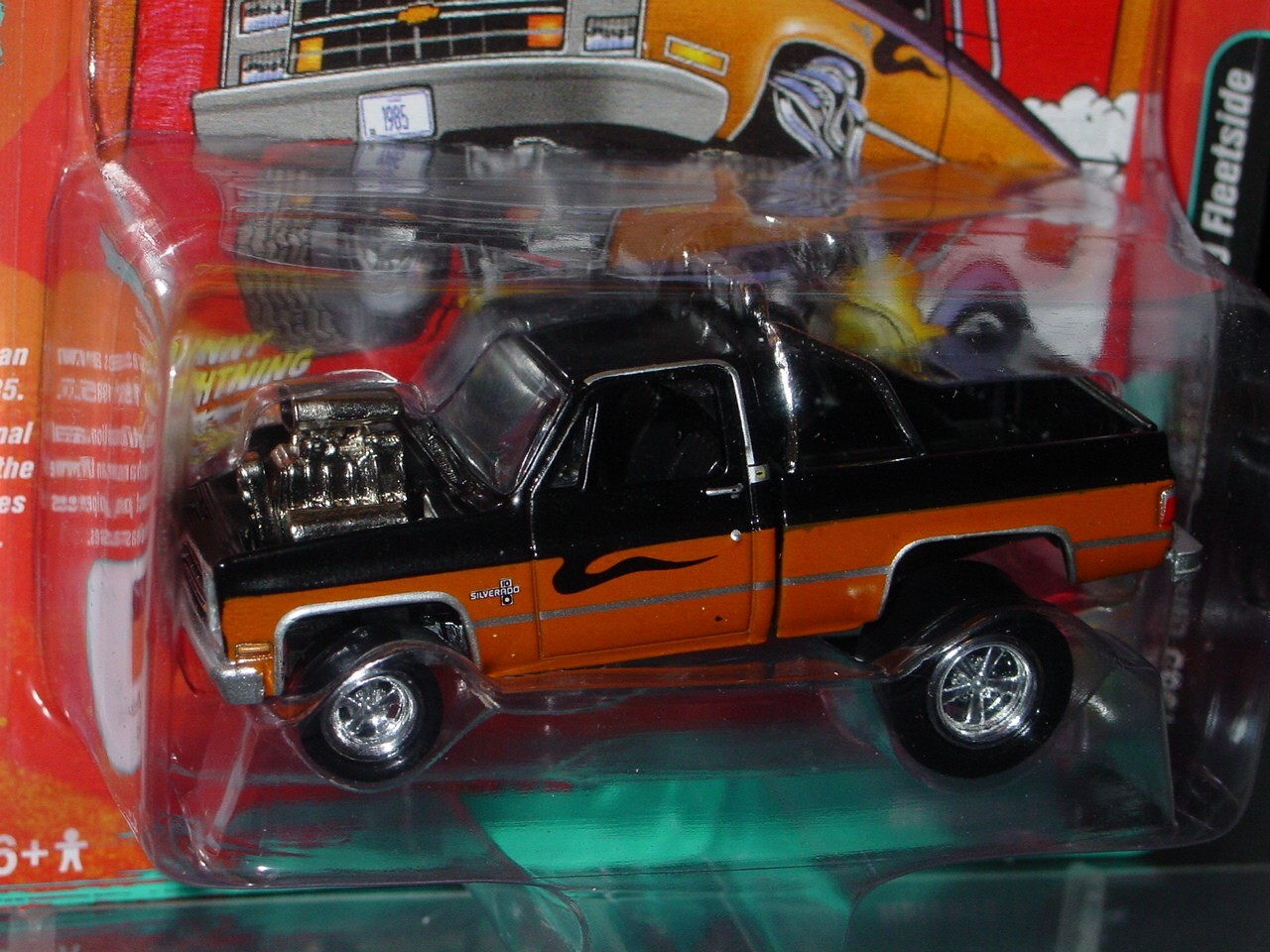 JOHNNY LIGHTNING 1985 CHEVY SILVERADO ZINGERS PICKUP TRUCK -Black/Orange MIP