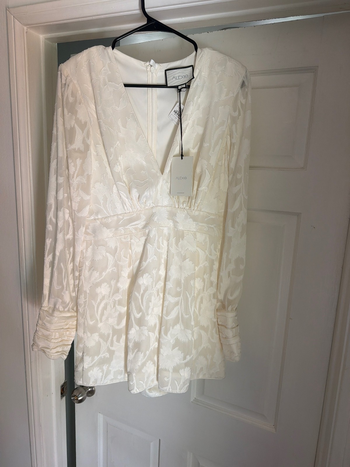 Alexis was ivory Jacquard V-Neck Long Sleeve Romper with Buttoned Cuffs Alexis was ivory Jacquard V-Neck Long Sleeve Romper with Buttoned Cuffs