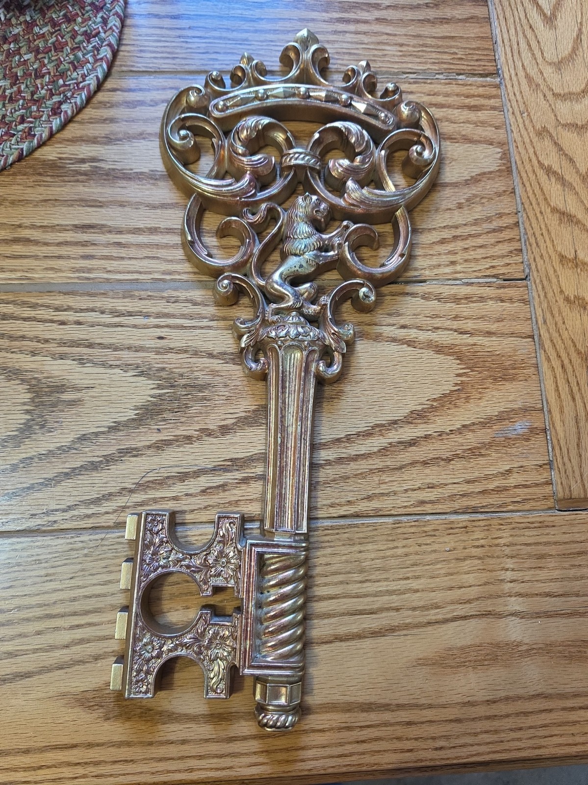 vintage Syroco gold skeleton key wall plaque featuring a standing lion motif... vintage Syroco gold skeleton key wall plaque featuring a standing lion motif...