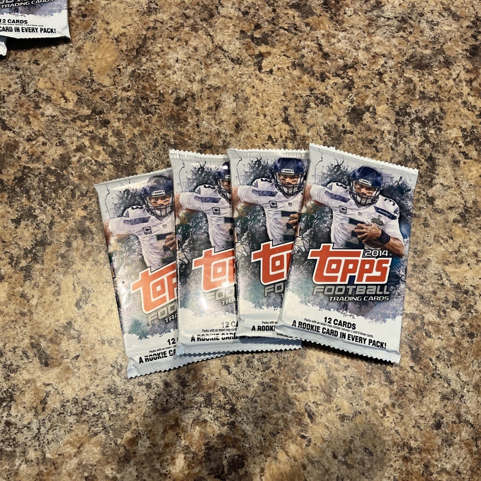 4 New Factory Sealed 2014 Topps Football 12 Card Packs Look 👀 Rare Seahawks 4 New Factory Sealed 2014 Topps Football 12 Card Packs Look 👀 Rare Seahawks