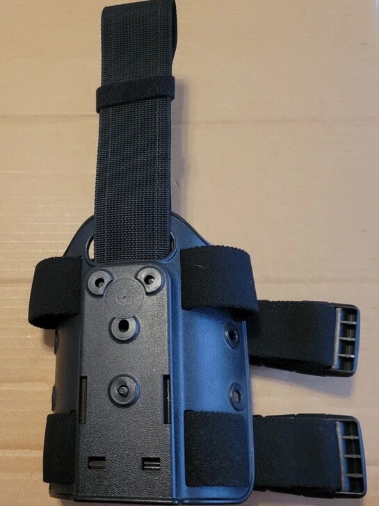 SAFARILAND 6004 TWO (2) STRAP TACTICAL DROP LEG THIGH PLATFORM BLACK EUC SAFARILAND 6004 TWO (2) STRAP TACTICAL DROP LEG THIGH PLATFORM BLACK EUC