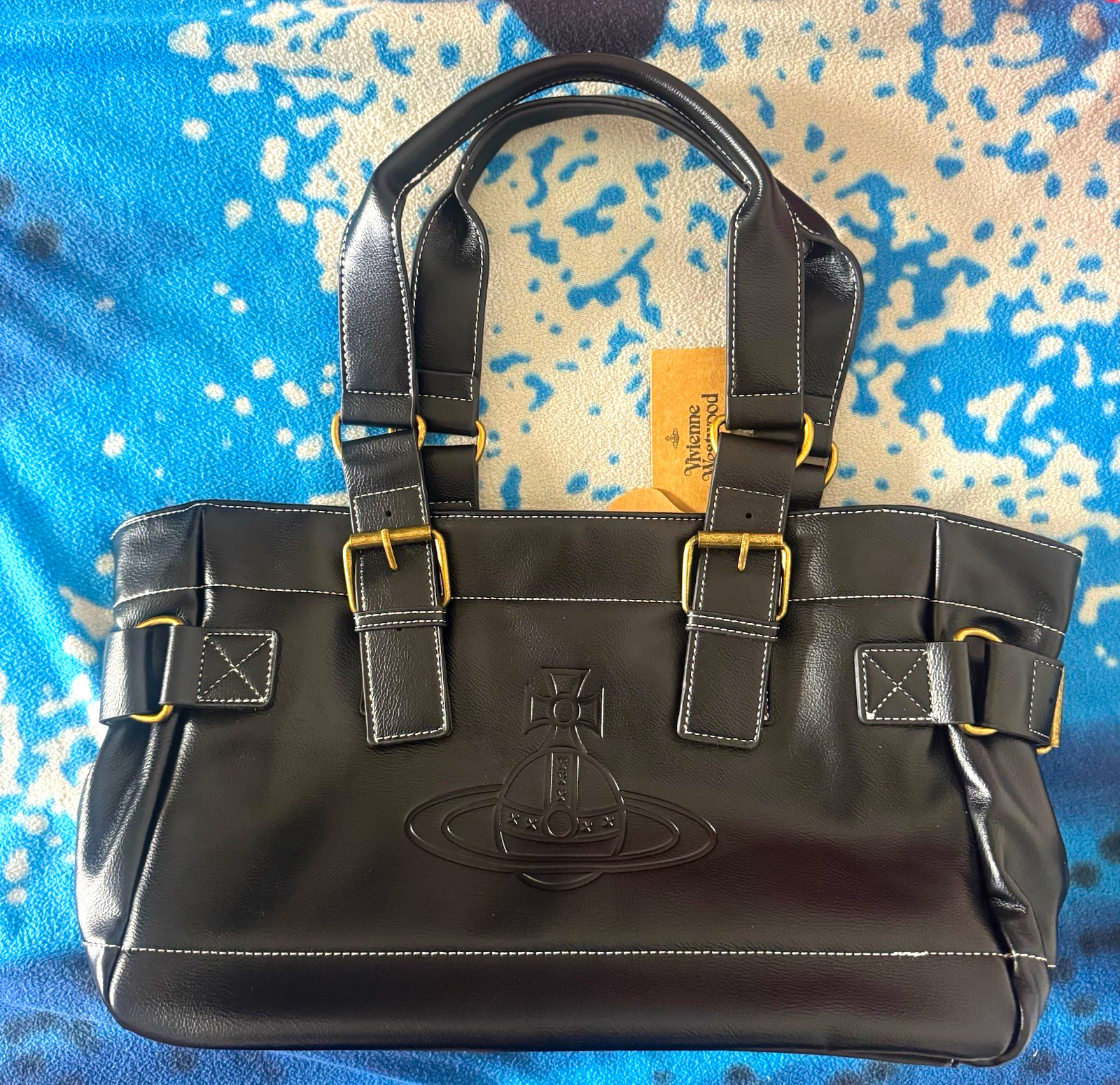 Vivienne Westwood Women’s Black Tote Bag Gold Buckle Hardware Pink Logo Lining Vivienne Westwood Women’s Black Tote Bag Gold Buckle Hardware Pink Logo Lining