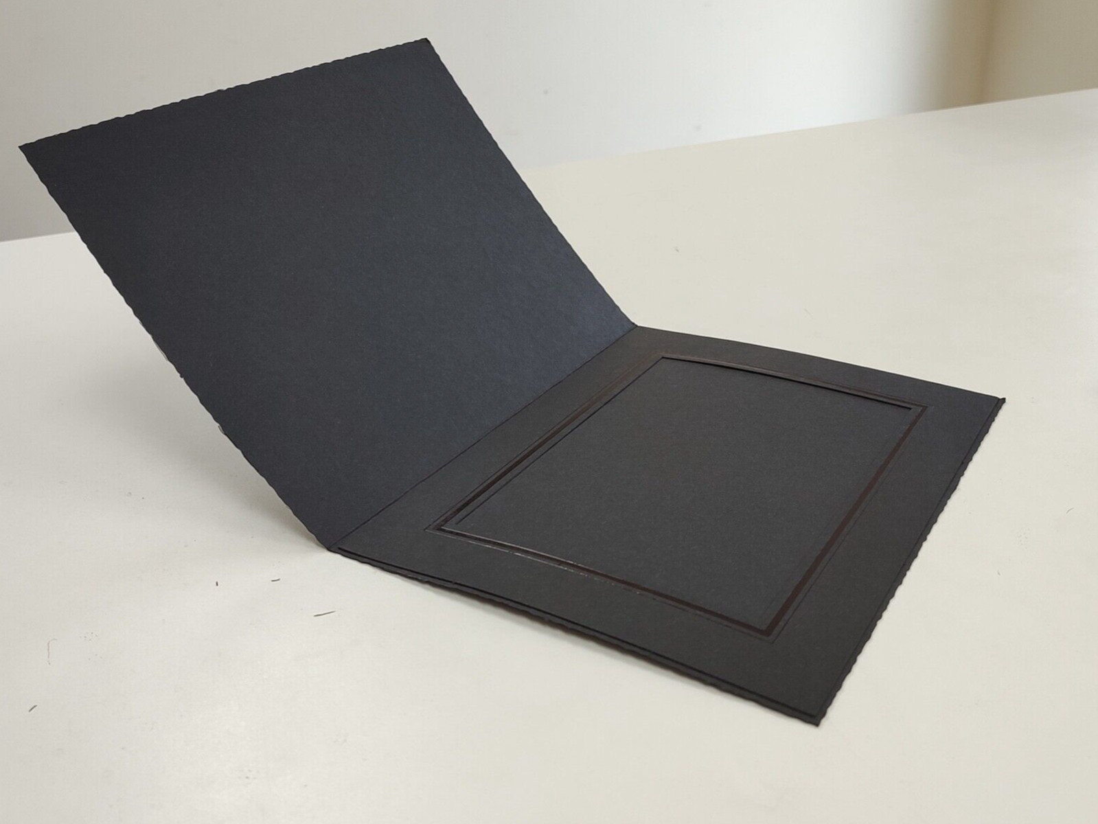 Photo folders - Tap 5x7 Black portrait folder - New pack of 250. Photo folders - Tap 5x7 Black portrait folder - New pack of 250.