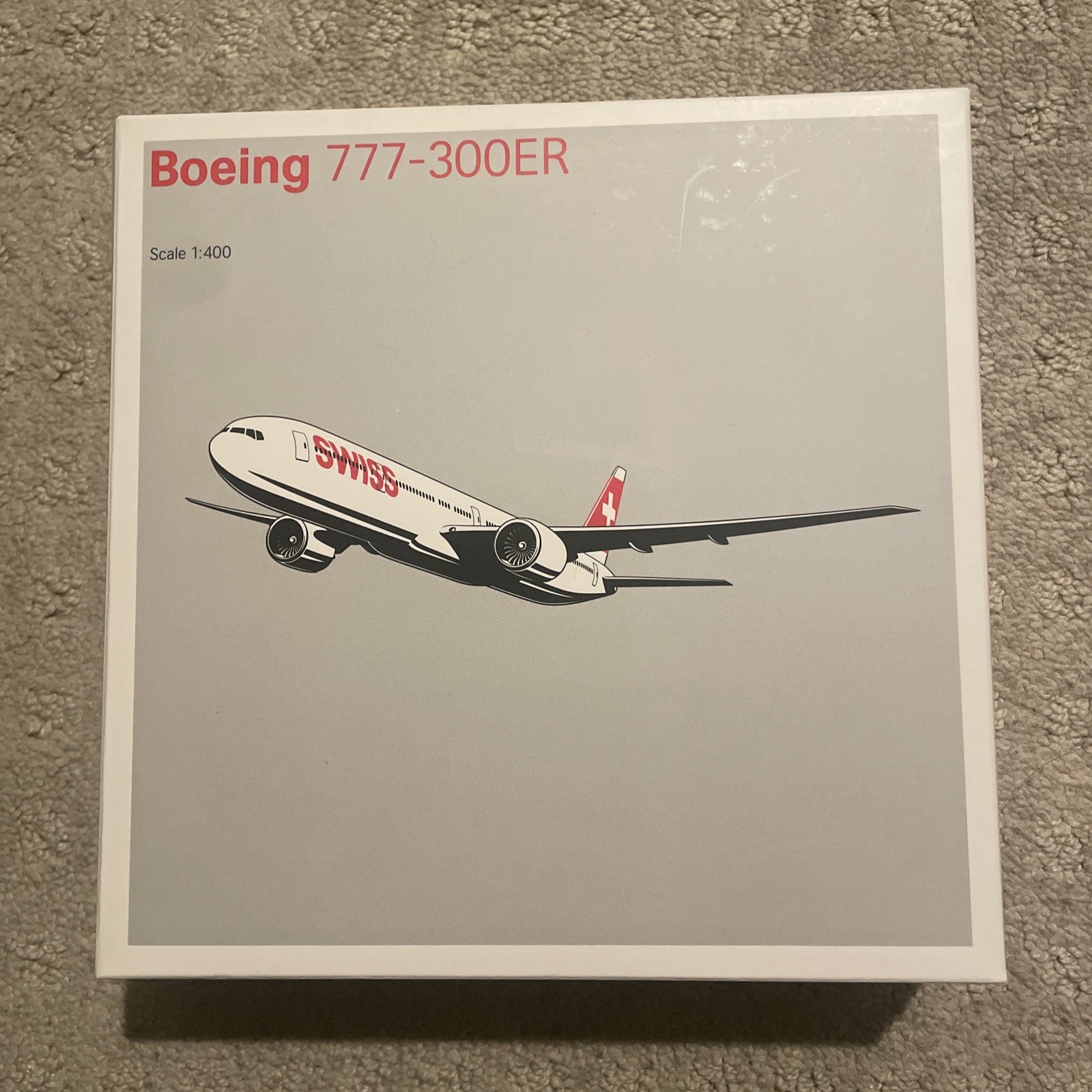 SWISS Boeing 777-300ER Commercial Airliner White/Red 1:400 Diecast Model SWISS Boeing 777-300ER Commercial Airliner White/Red 1:400 Diecast Model