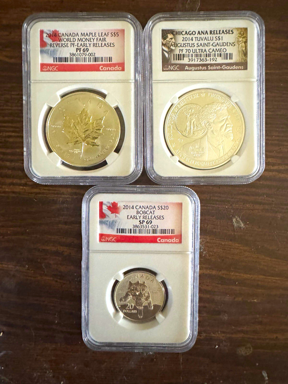 (1) 2014 Tuvalu Dollar (1) 2014 Canadian Maple Leaf (1) 2014 Canadian Bobcat (1) 2014 Tuvalu Dollar (1) 2014 Canadian Maple Leaf (1) 2014 Canadian Bobcat