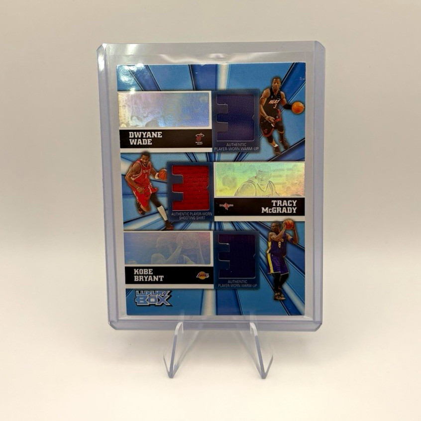 2005-06 Topps Luxury Box - Triple Relic Wade / McGrady / Kobe GU Patch #/250 2005-06 Topps Luxury Box - Triple Relic Wade / McGrady / Kobe GU Patch #/250