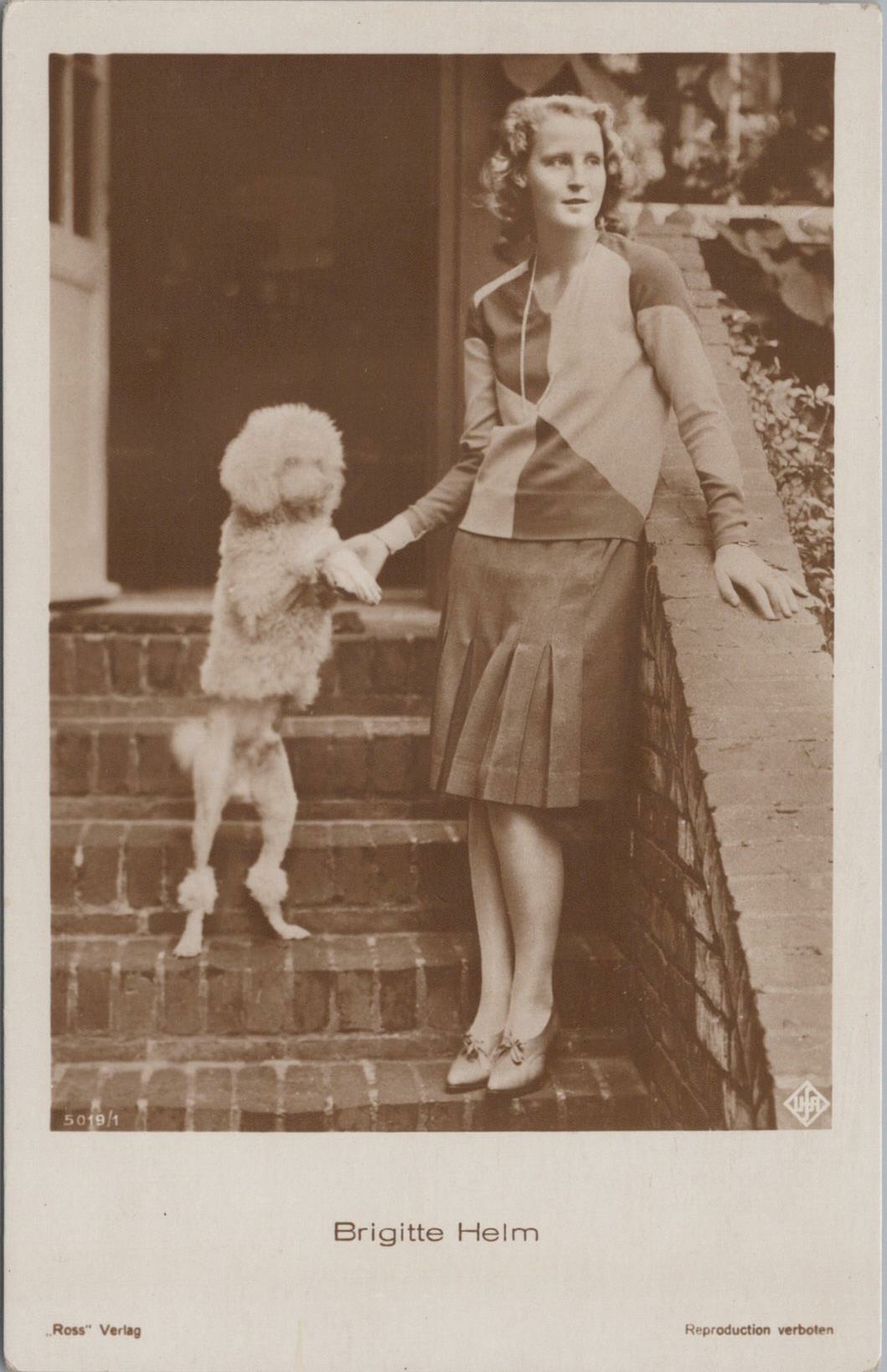 RPPC Postcard Brigitte Helm Holding Paw Giant Poodle