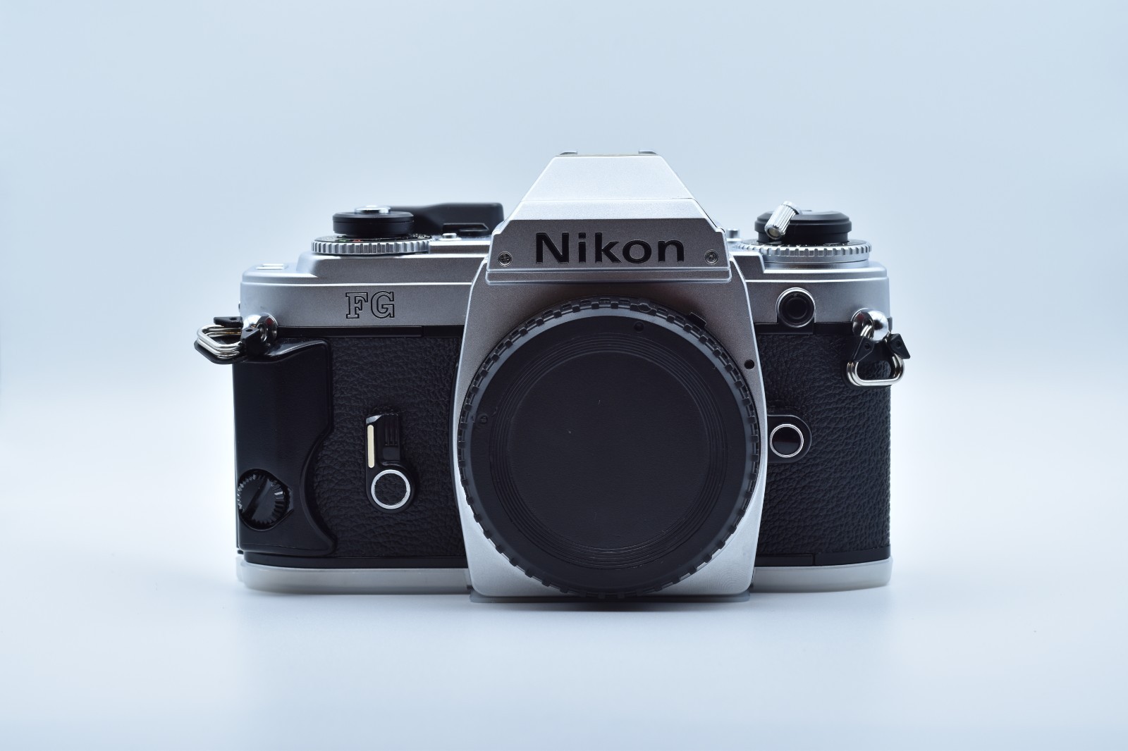 Nikon FG Silver 35mm SLR Film Camera Body, Strap & Instruction Manual NEAR MINT Nikon FG Silver 35mm SLR Film Camera Body, Strap & Instruction Manual NEAR MINT
