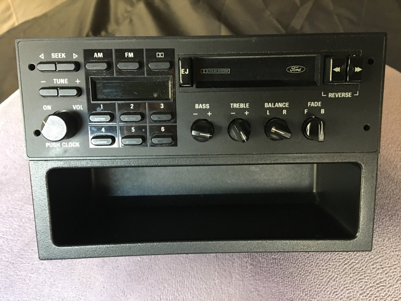 1987-1993 Ford Mustang Radio AM/FM Cassette Stock Factory Storage Cup 1987-1993 Ford Mustang Radio AM/FM Cassette Stock Factory Storage Cup