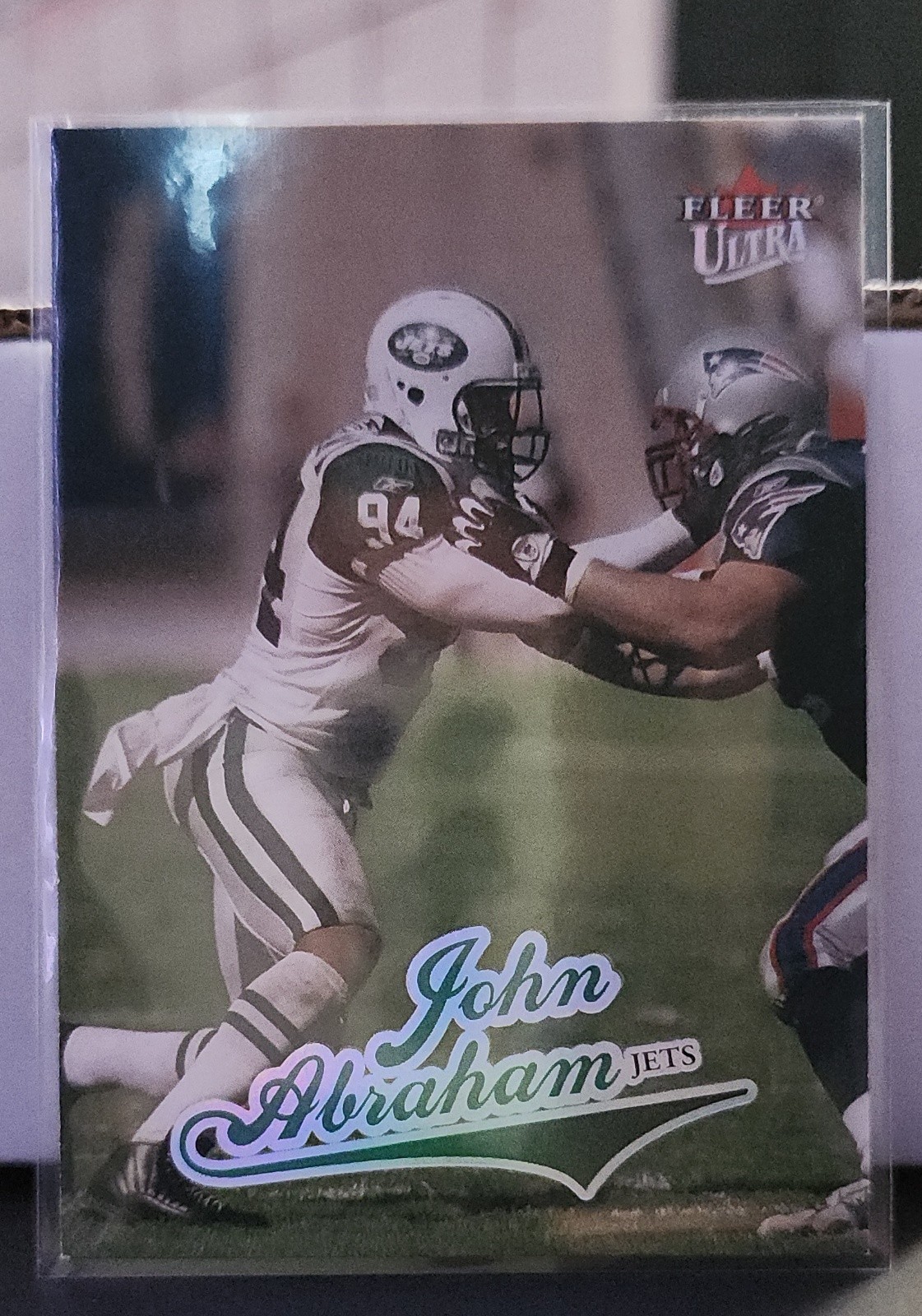 2004 Fleer Ultra - John Abraham #80 Platinum Medallion /66 2004 Fleer Ultra - John Abraham #80 Platinum Medallion /66