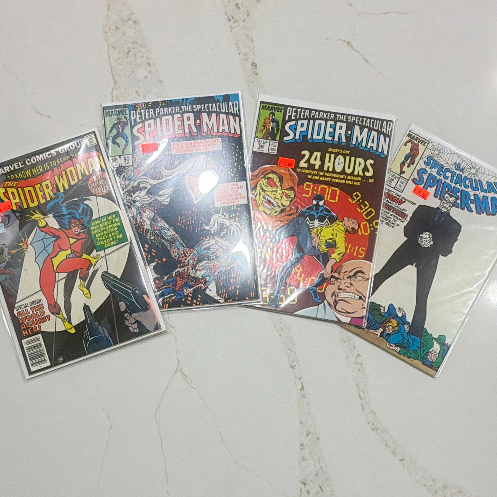 Marvel Comics mixed comic book lot: 4 total Spider-Woman #1 newsstand boarded Marvel Comics mixed comic book lot: 4 total Spider-Woman #1 newsstand boarded