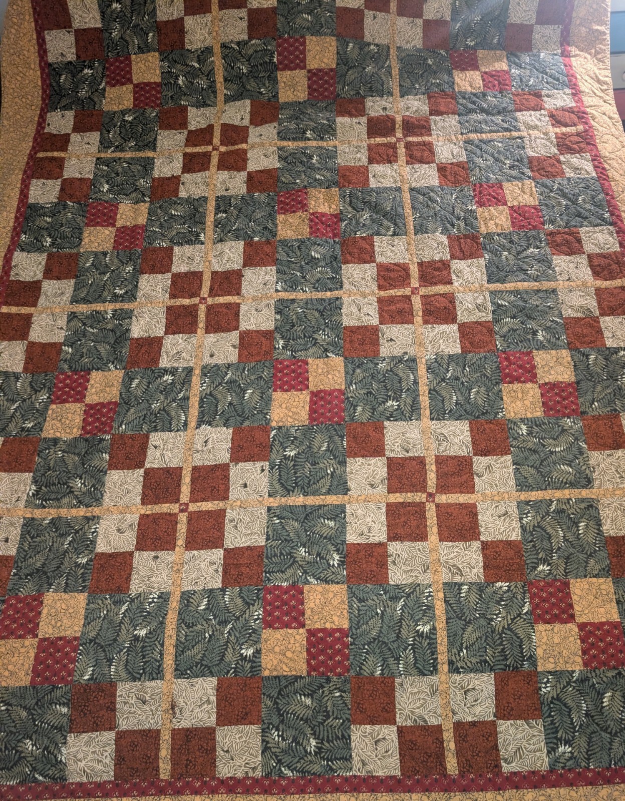 Vintage Handmade Quilt With Warm Green, Brown, And Tan Autumn Patchwork