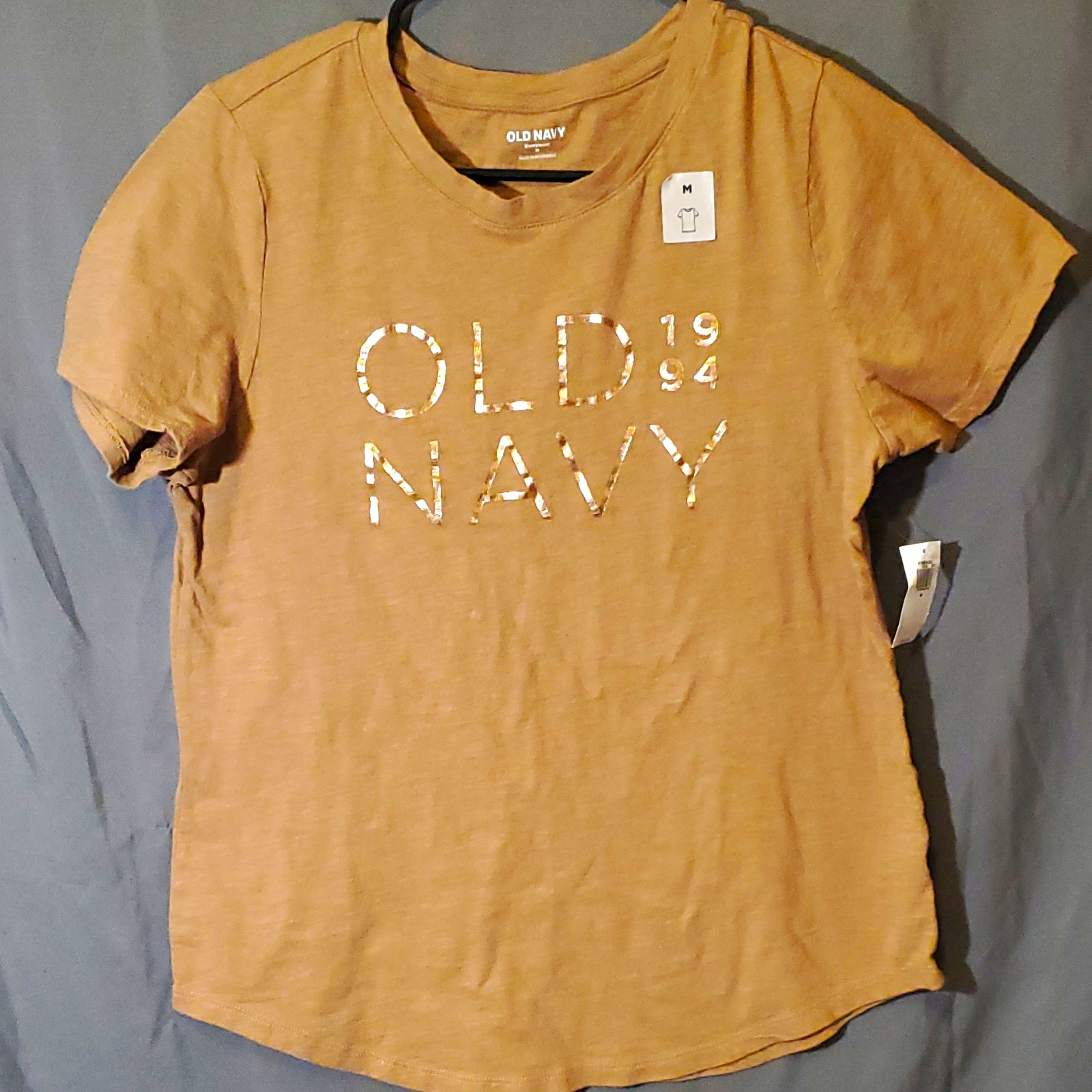 Old Navy Women’s Tan Logo Graphic Cotton Knit Crew Neck Short Sleeve Tee M Old Navy Women’s Tan Logo Graphic Cotton Knit Crew Neck Short Sleeve Tee M