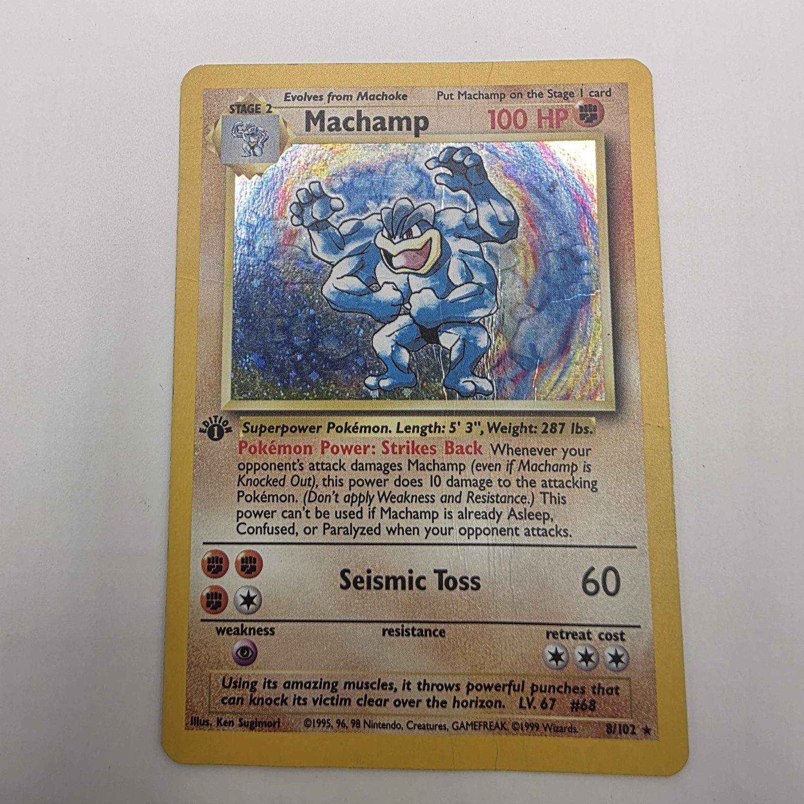 1999 Pokémon Base Set Machamp 1st Edition Holo Rare #8/102.