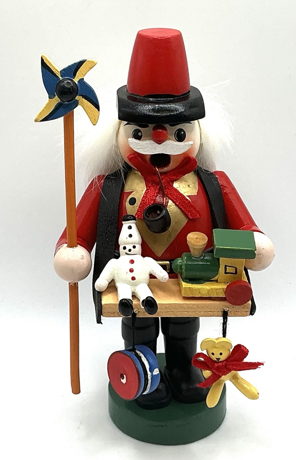 Nutcracker Smoker Figurine “Peddler” Accented With Toys Wooden Germany Vintage