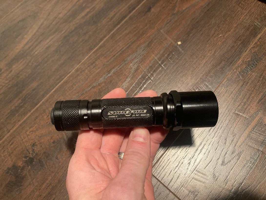Vintage Surefire 6p flashlight with Lumens Factory clicky tailcap