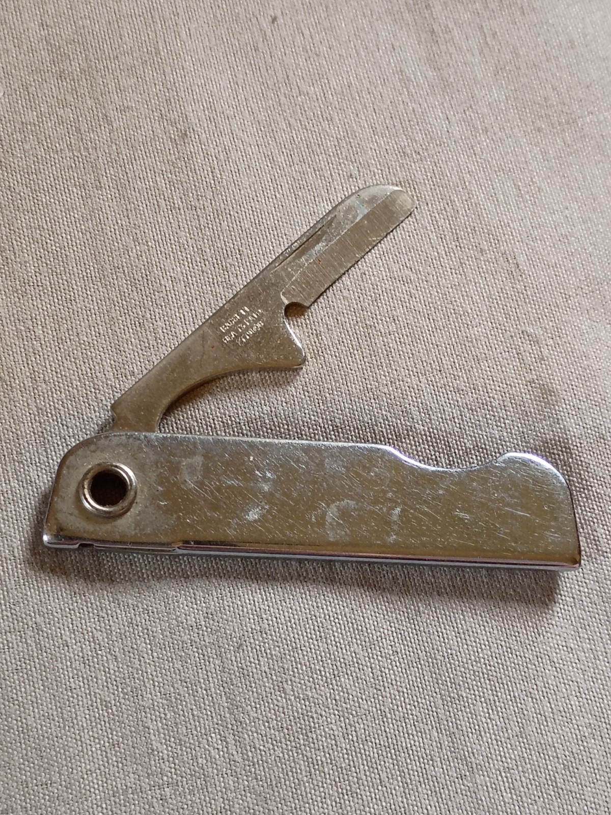 Vintage Bassett Folding Nail Care Tool.