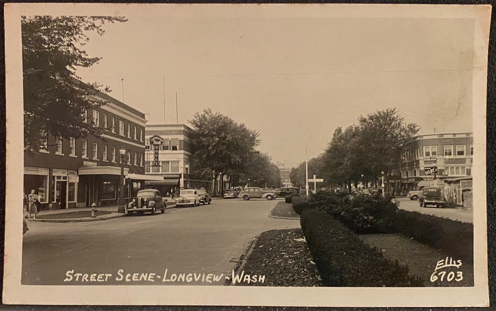 Real Photo Postcard RPPC Longview WA Street Scene w Old Autos Rexall Drug Store