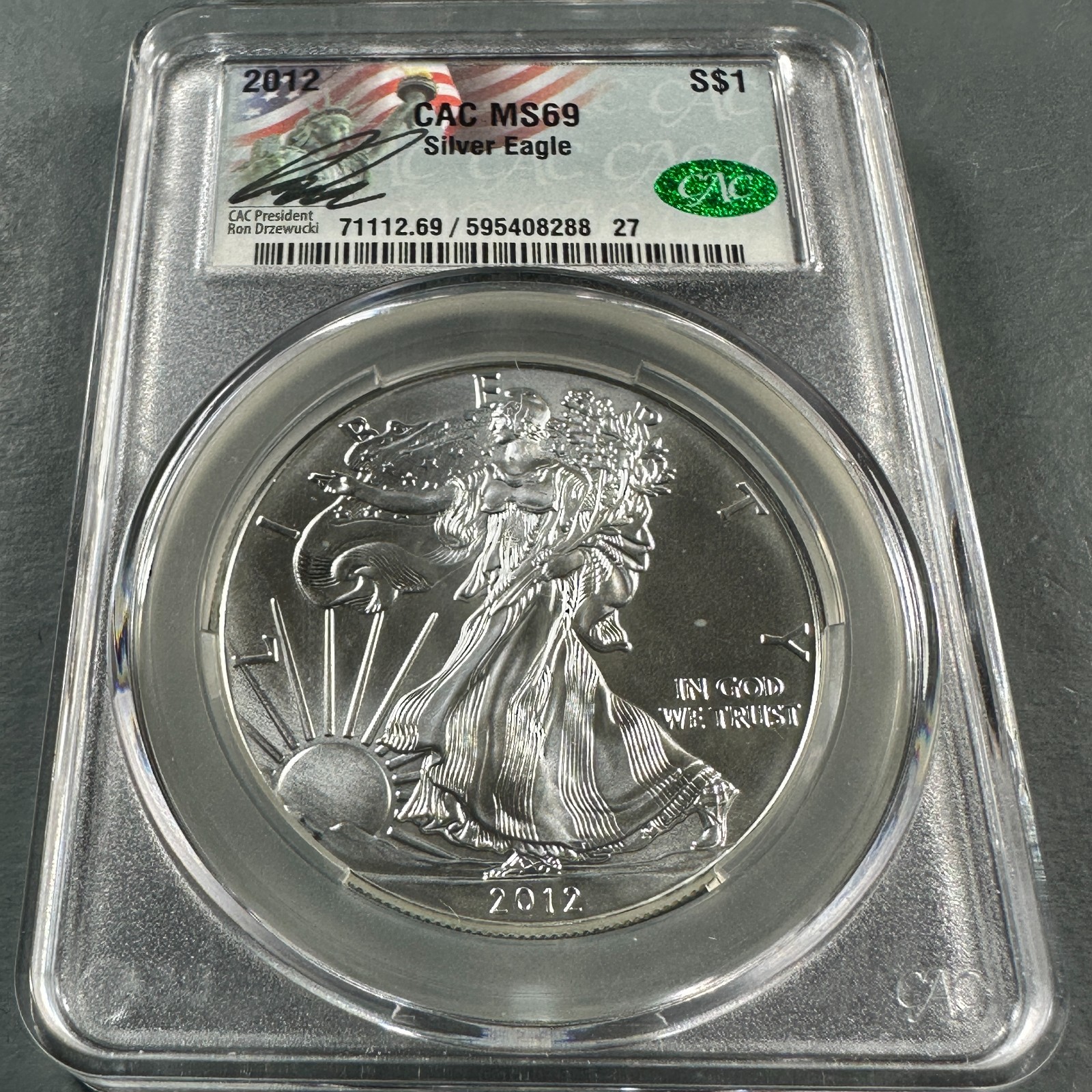 2012 Silver Eagle CAC MS69, signed by CAC President, Ron Drzewucki (90932)
