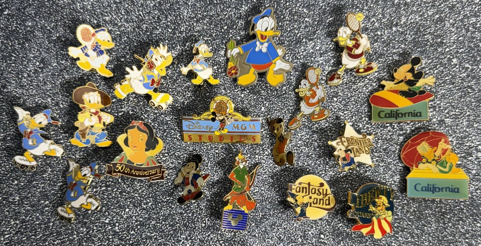 Lot of 19 Vintage Disney Pins - Donald, Mickey, MGM Studios, California, Lands Lot of 19 Vintage Disney Pins - Donald, Mickey, MGM Studios, California, Lands