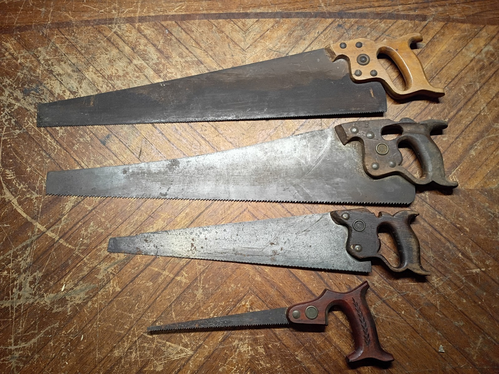 Lot of 4 Vintage Hand Saws Disston, Simonds Warranted Superior Germay Lot of 4 Vintage Hand Saws Disston, Simonds Warranted Superior Germay