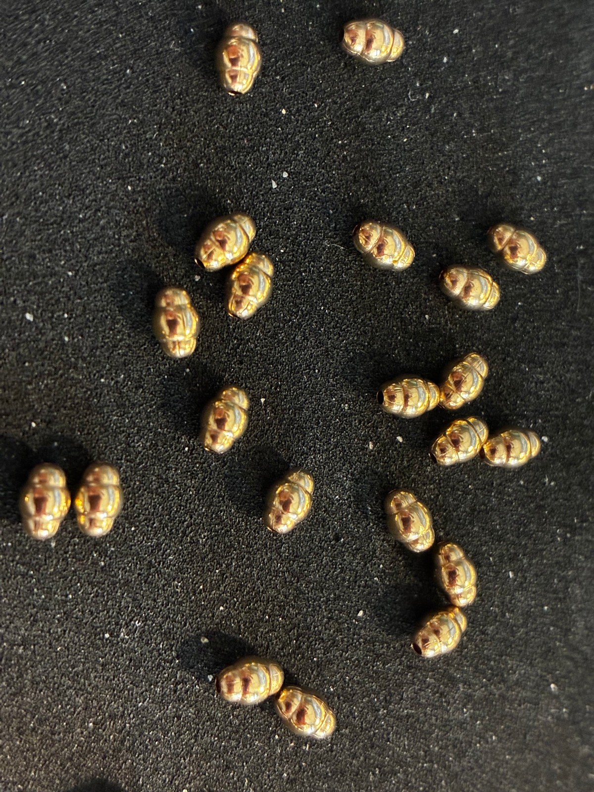 12K GOLD FILLED 3x5mm Corrugated Pearl Shape Beads . Bag of 50 pieces. Stunning