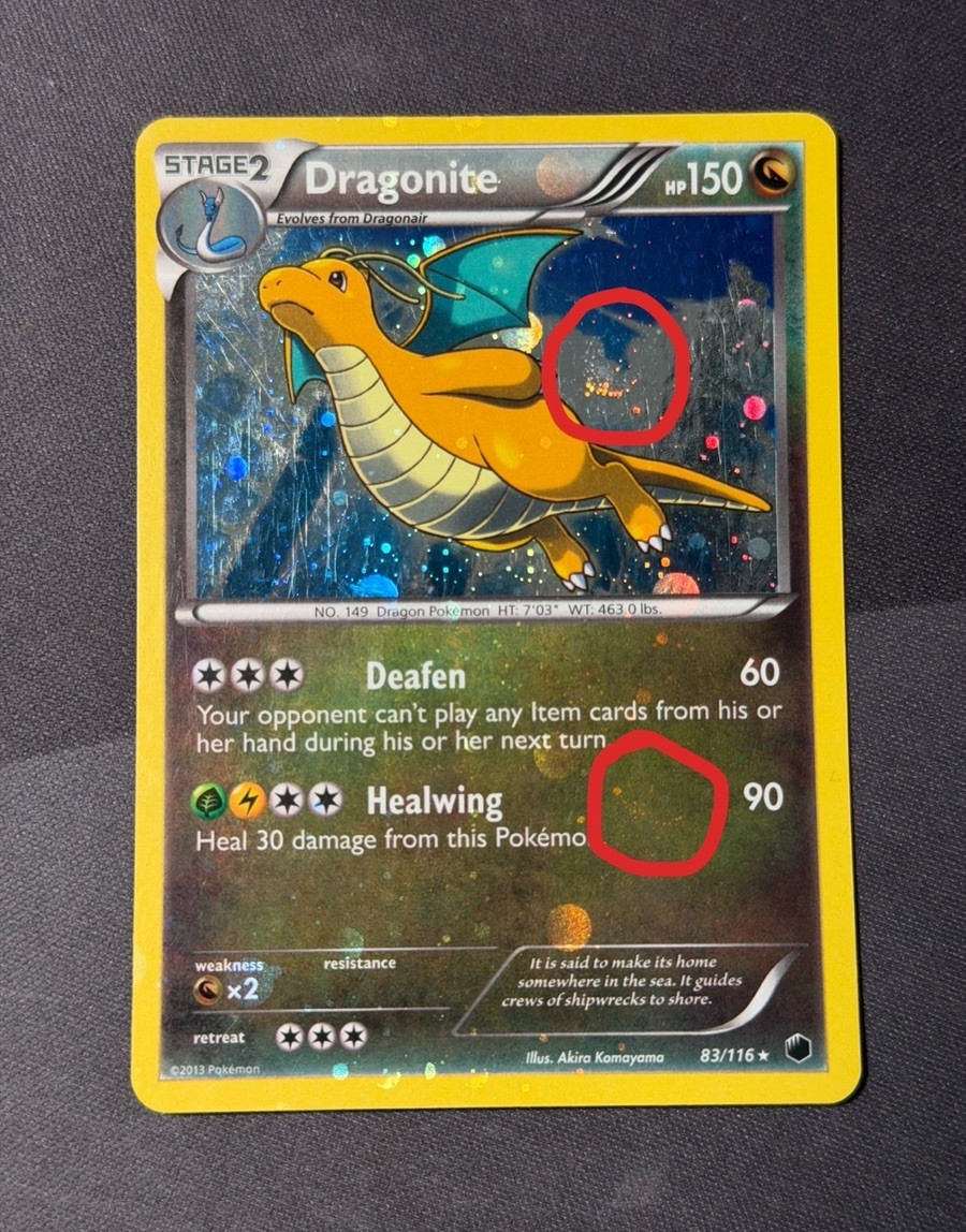 Dragonite 83/116 Cosmos Holo DOUBLE SWIRL + HOLO BLEED Blister Exclusive