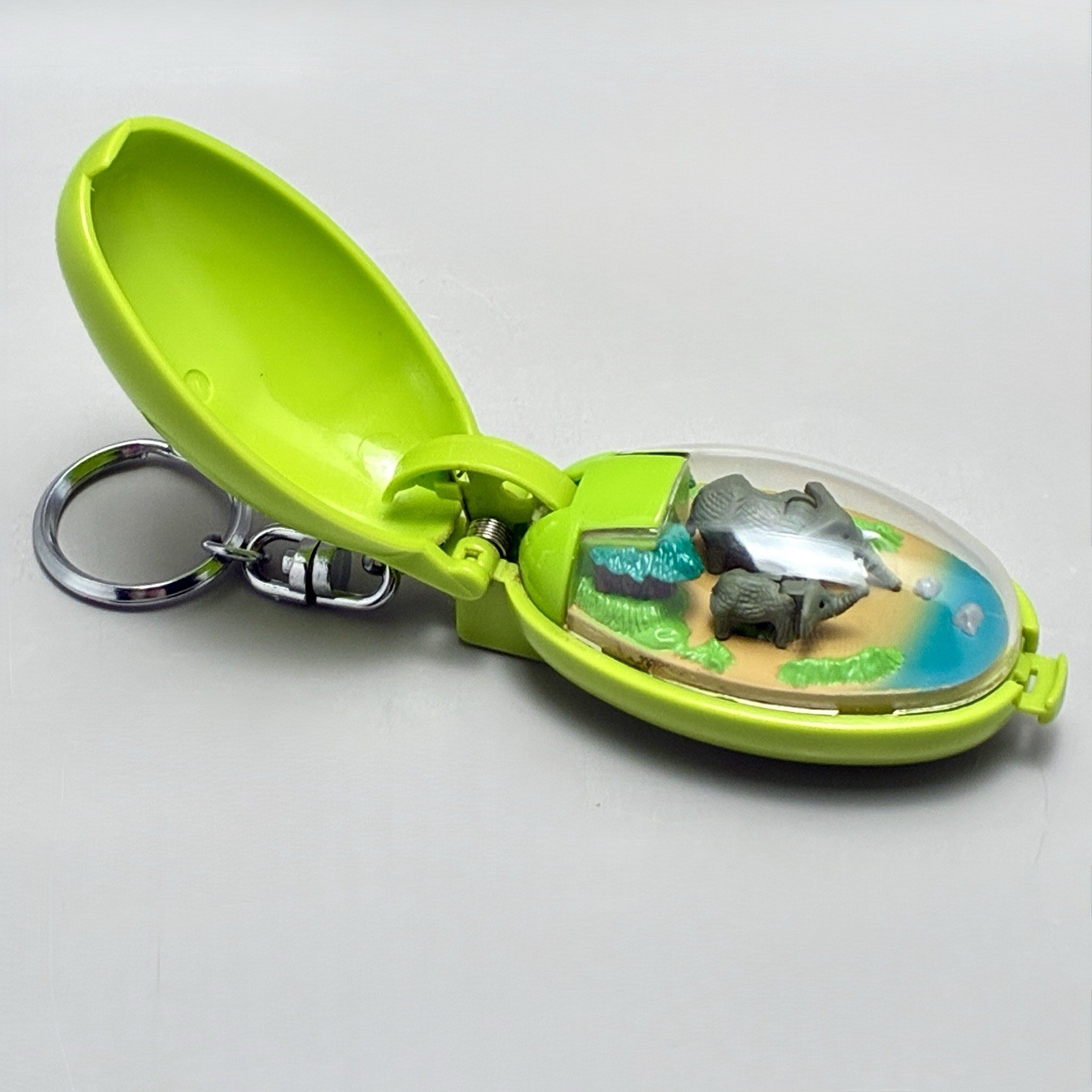Vintage 1993 Takara Pocket Critters Keychain Elephants Green Case WORKS Vintage 1993 Takara Pocket Critters Keychain Elephants Green Case WORKS