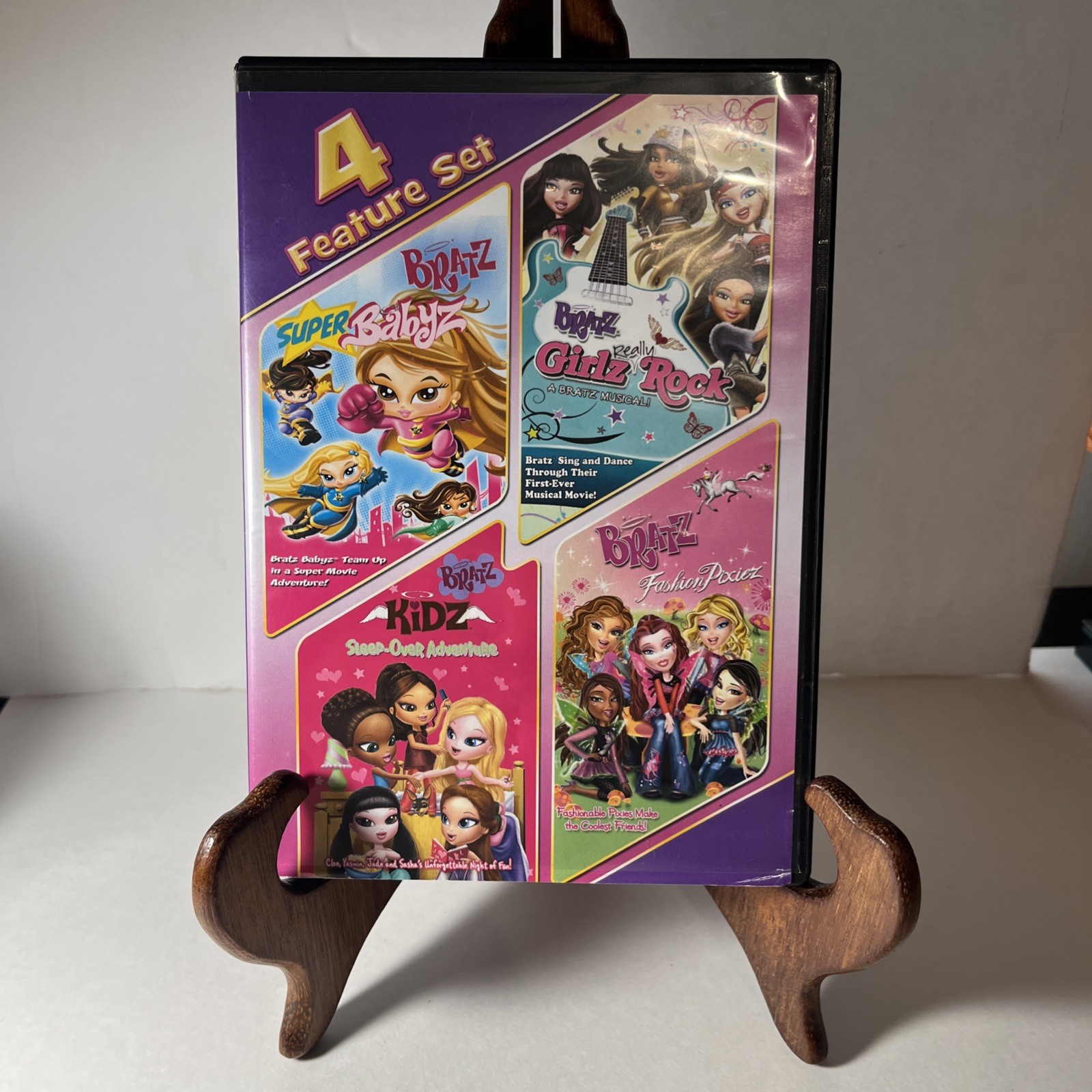 Bratz 4 Feature Set DVD Super Babyz/Girlz Rock/Kidz Sleepover/Fashion Pixiez DVD Bratz 4 Feature Set DVD Super Babyz/Girlz Rock/Kidz Sleepover/Fashion Pixiez DVD