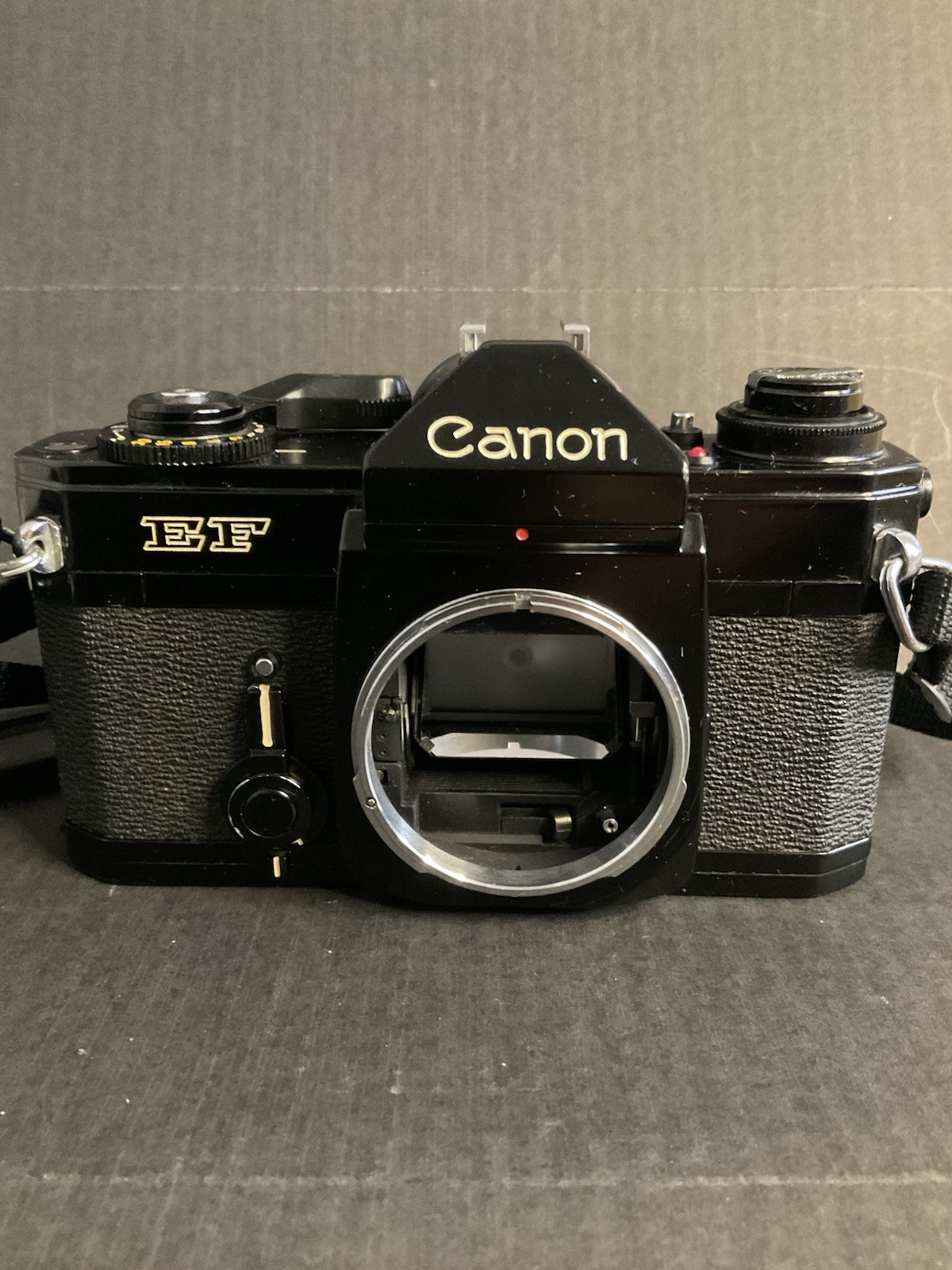 VINTAGE CANON EF 35mm CAMERA SLR  W/ STRAP. BODY ONLY. SHUTTER WORKS. GOOD COND